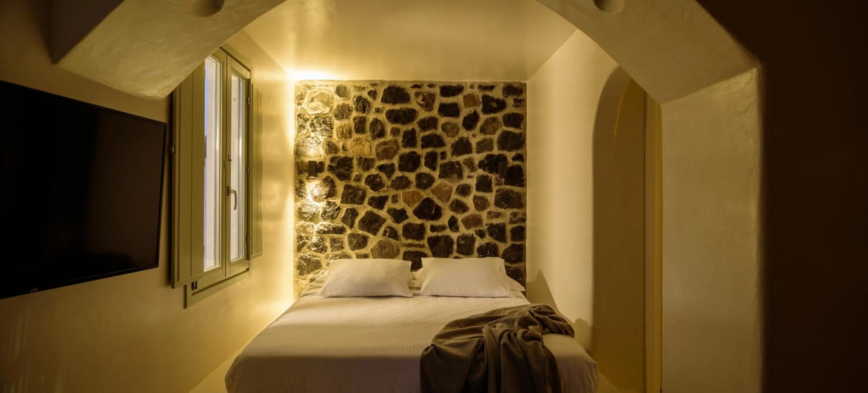 Bed in Terra Blanca Suites