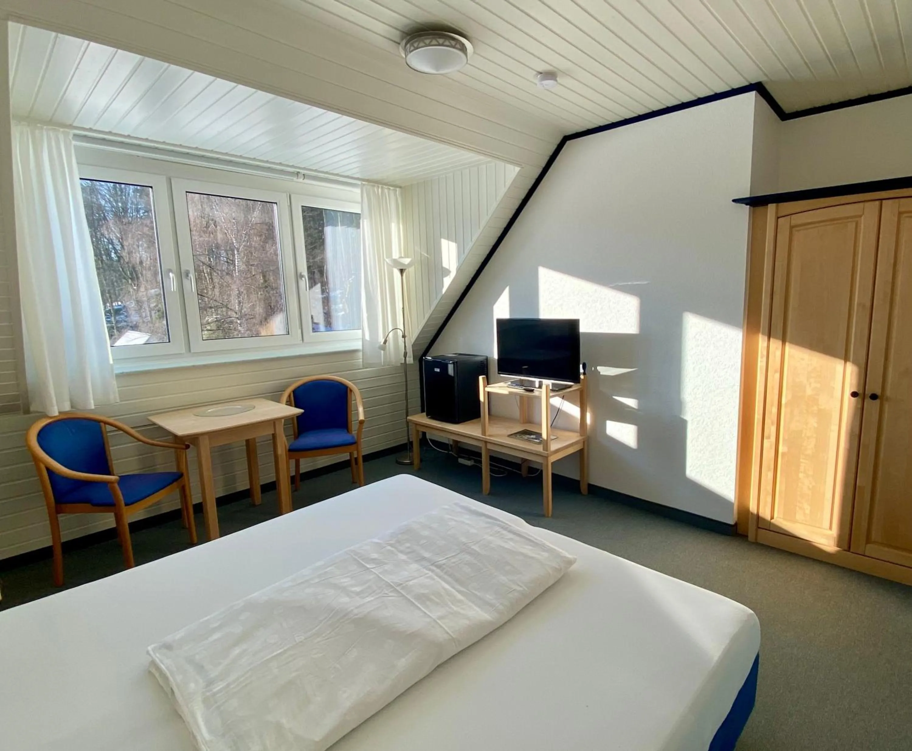 Bed in Gästehaus Brütting