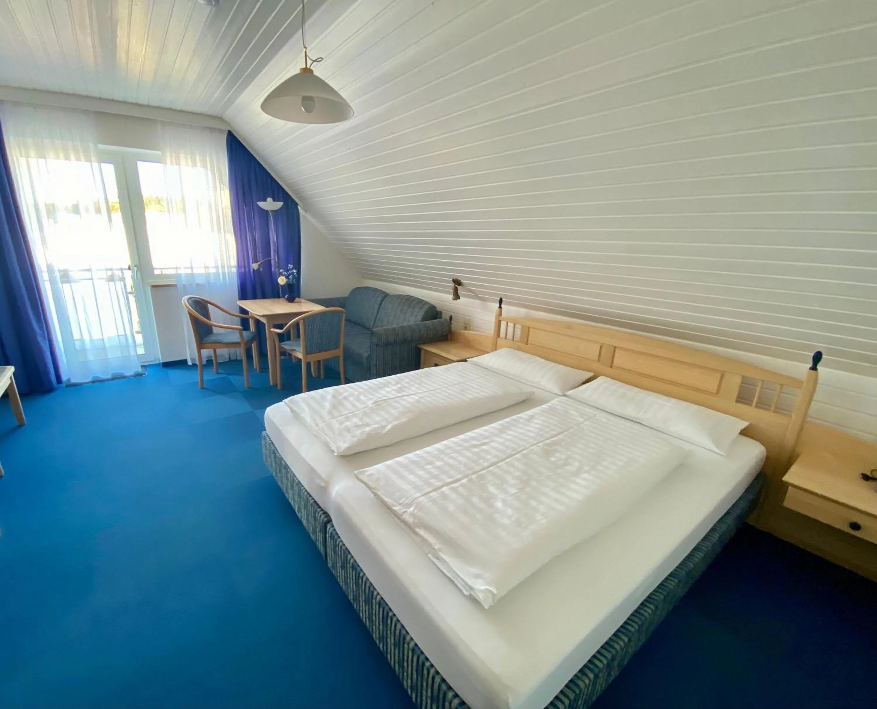 Bed in Gästehaus Brütting