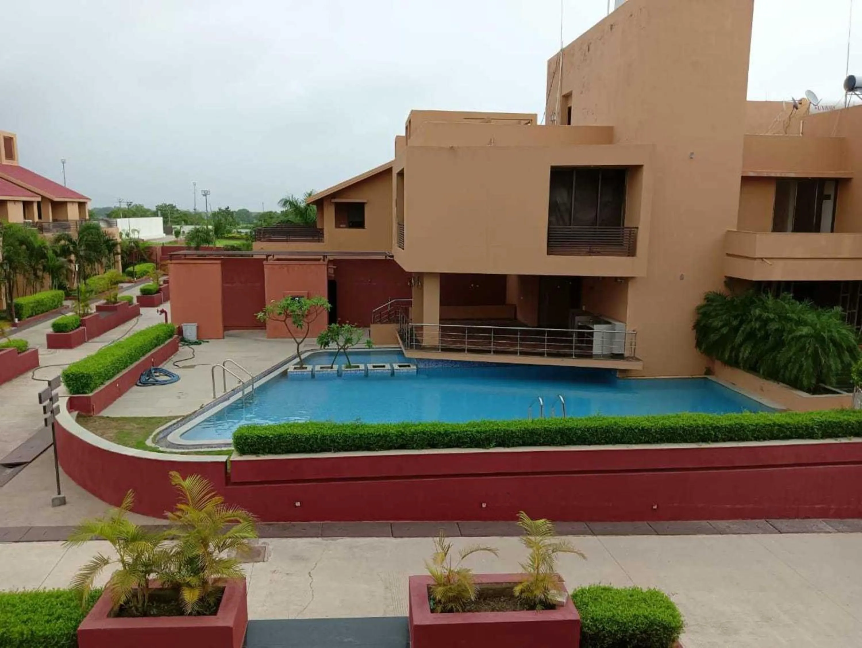Swimming pool in Palette by CheckIn The Royal Castle Resort Rajkot