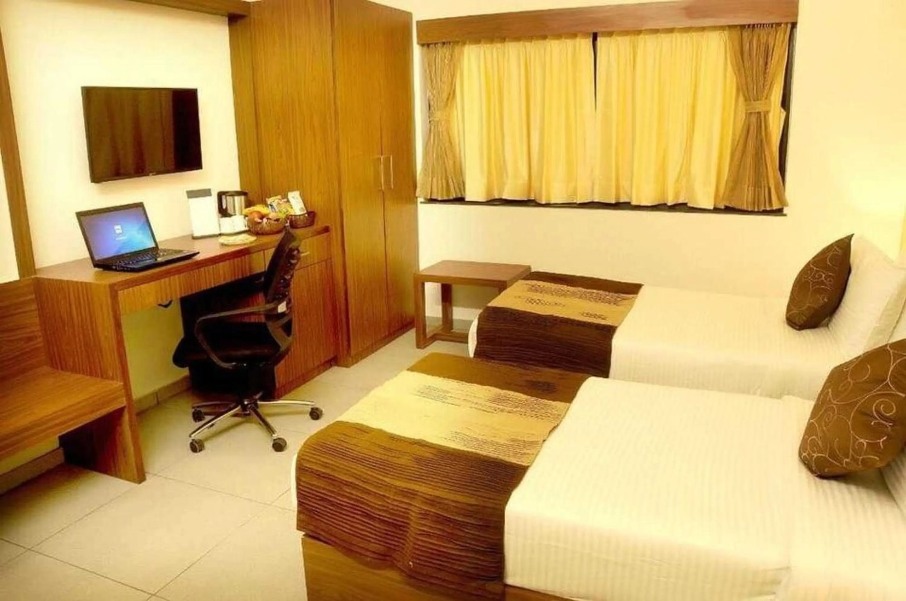 Bed in Palette by CheckIn The Royal Castle Resort Rajkot