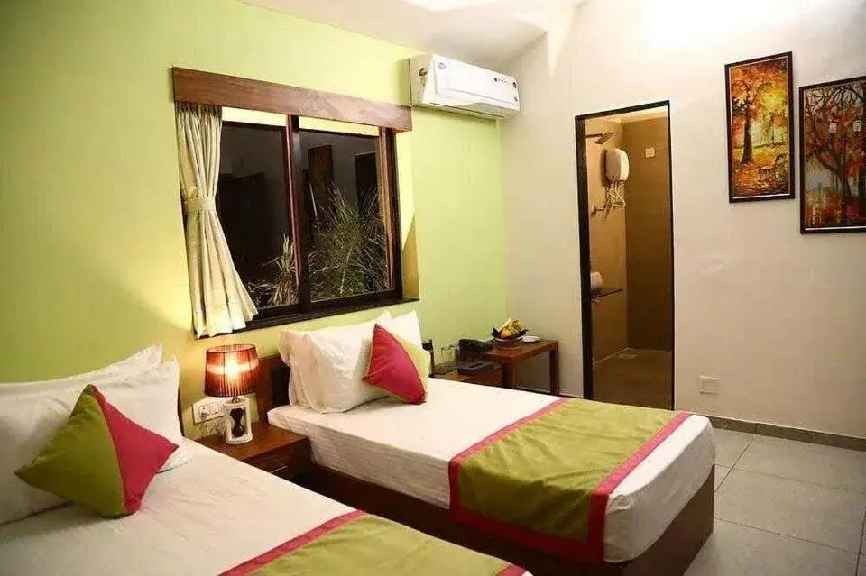 Deluxe Double or Twin Room in Palette by CheckIn The Royal Castle Resort Rajkot Deluxe Double or Twin Room in Palette by CheckIn The Royal Castle Resort Rajkot