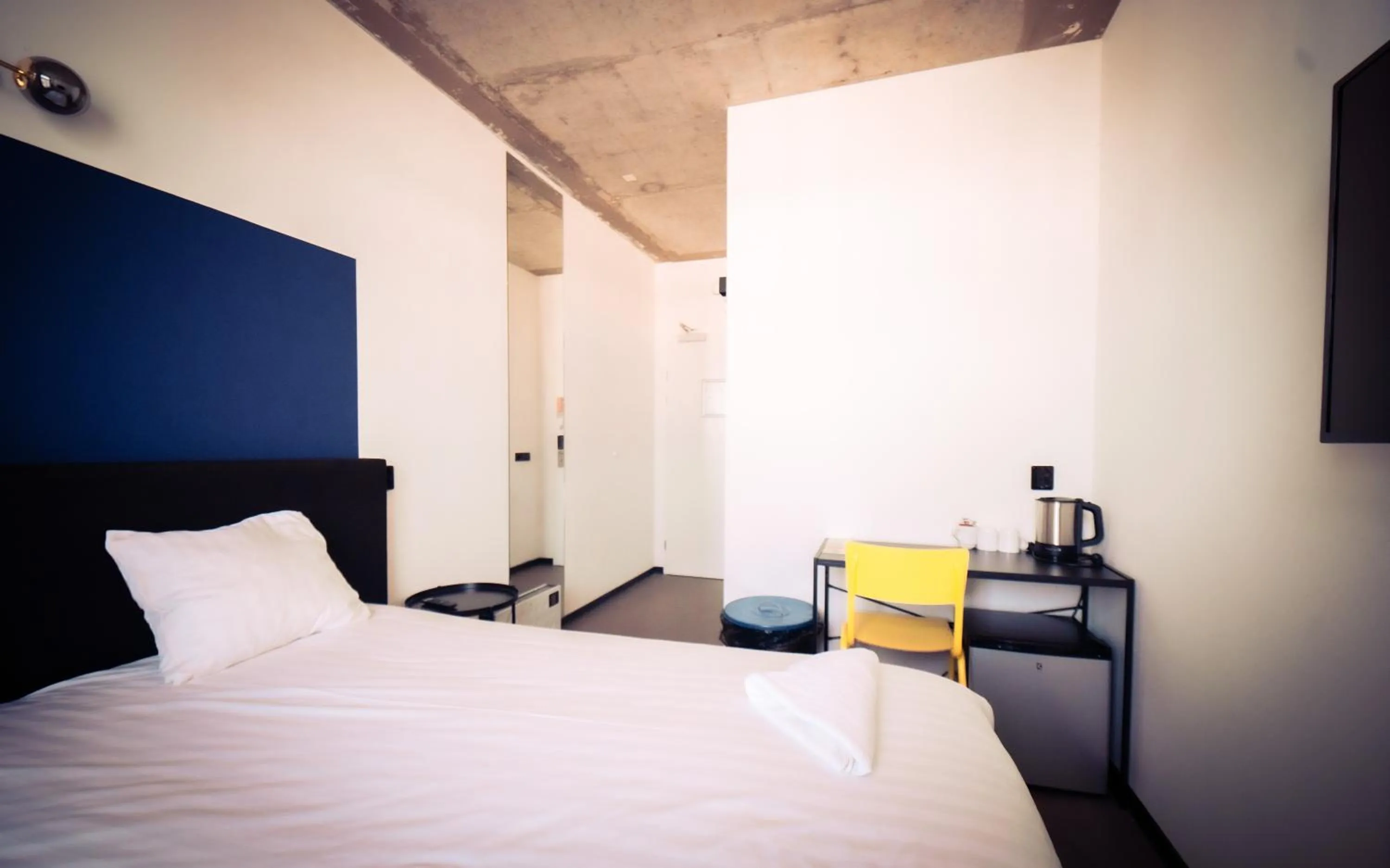 Bed in Urban Hotel The Golden Stork