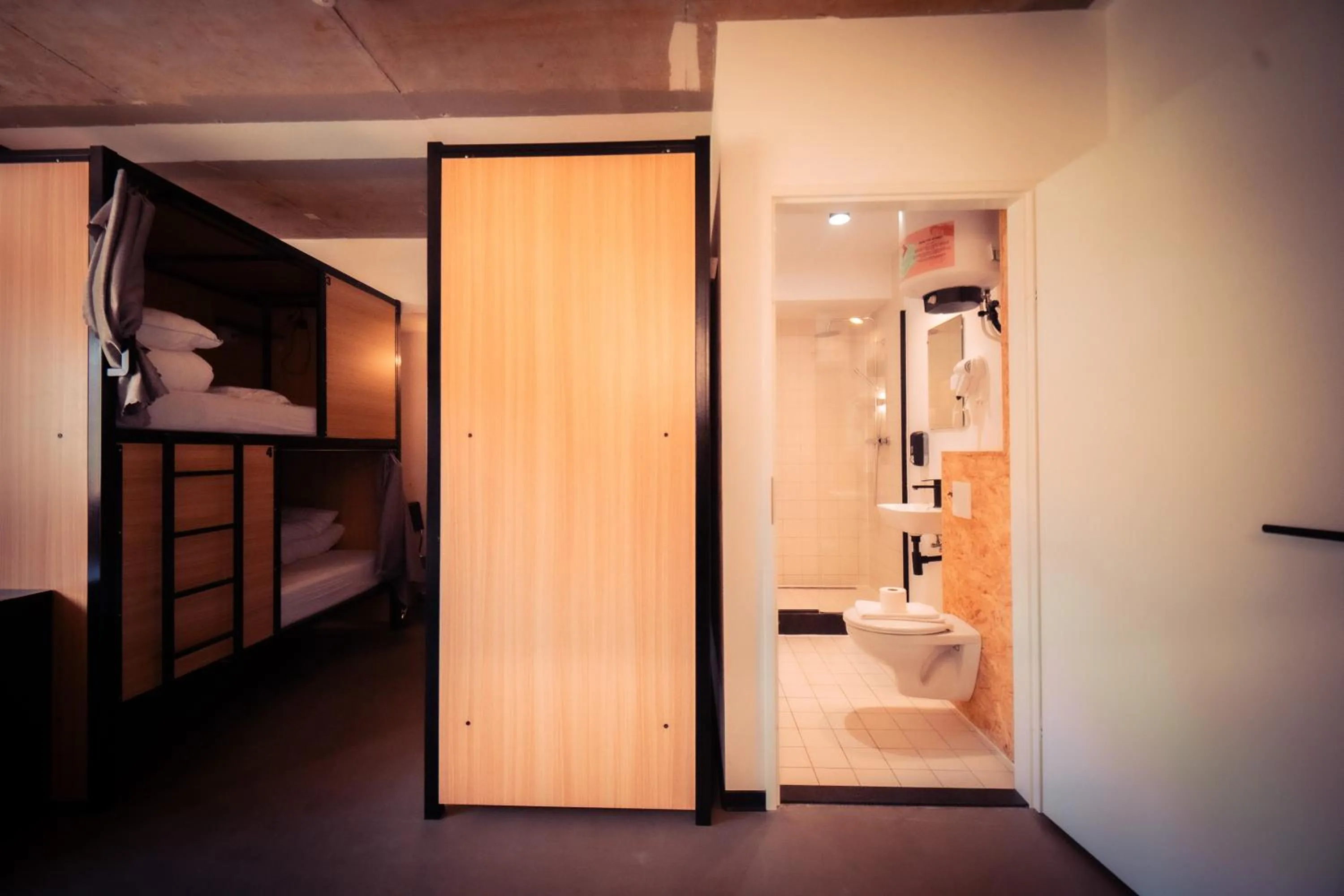 Bathroom, Bed in Urban Hotel The Golden Stork