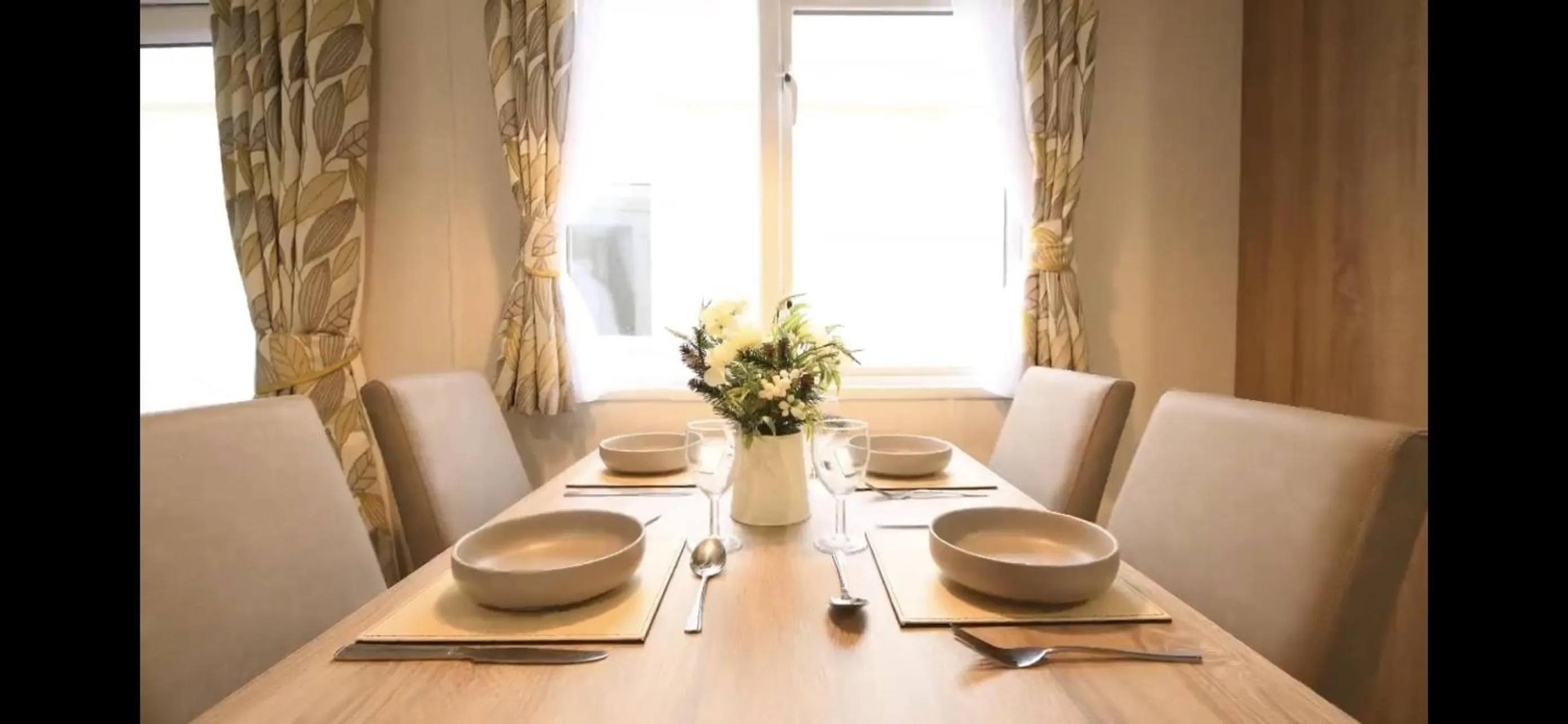 Seating area in Coopers Beach 3-Bed Caravan Sleeps 8 & Pets Ok