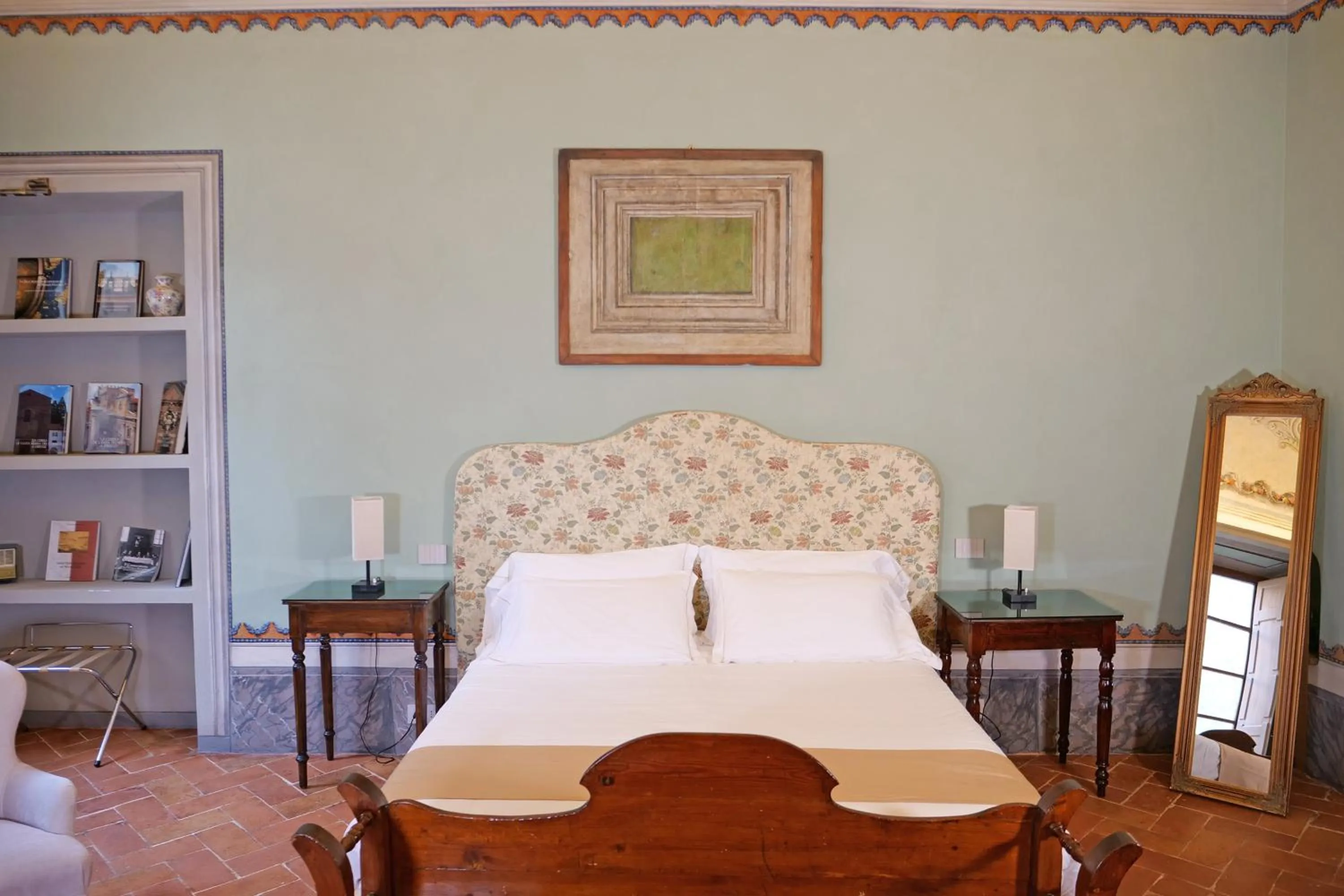 Bed in Delcorto Suites