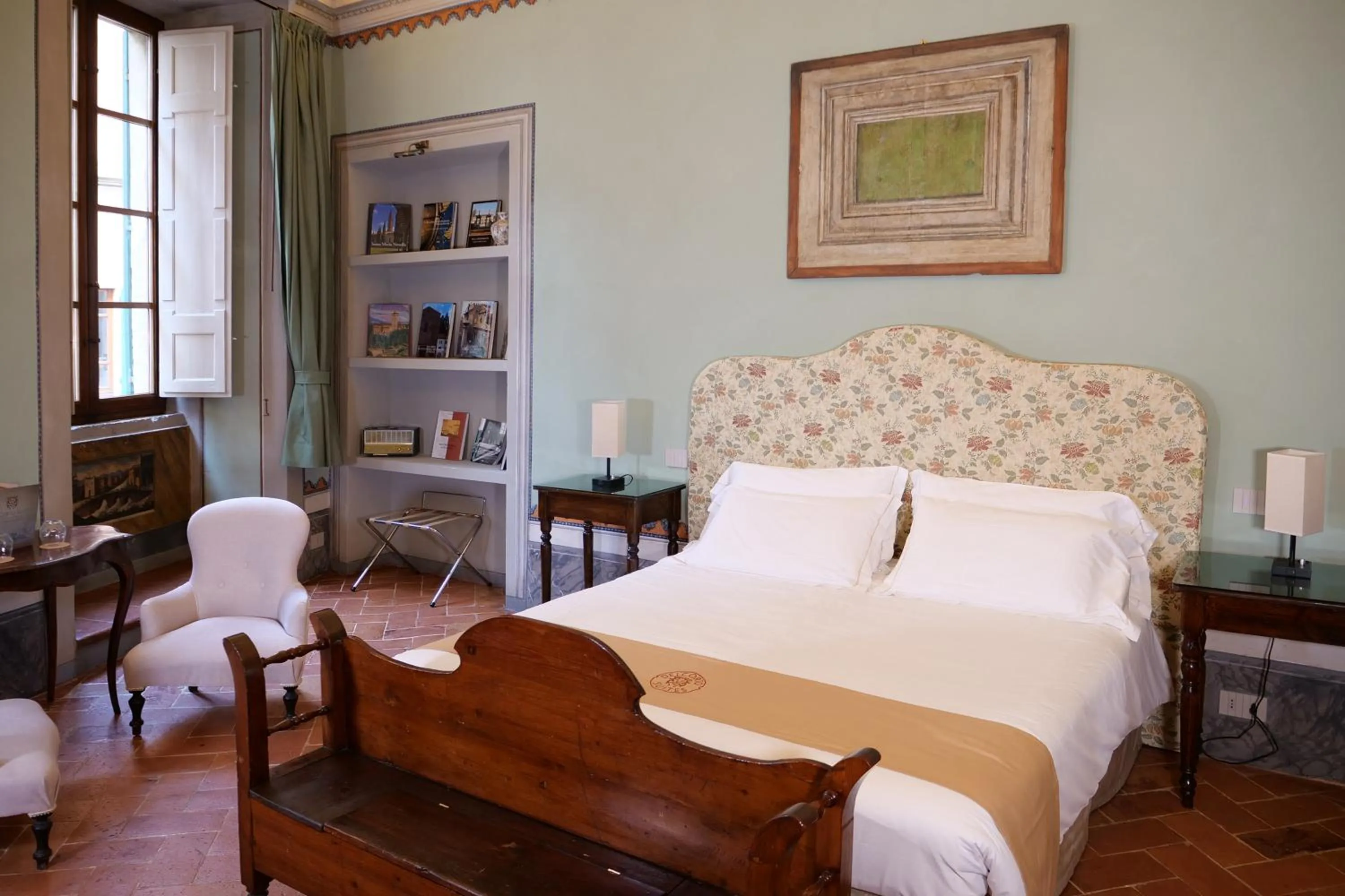 Bed in Delcorto Suites