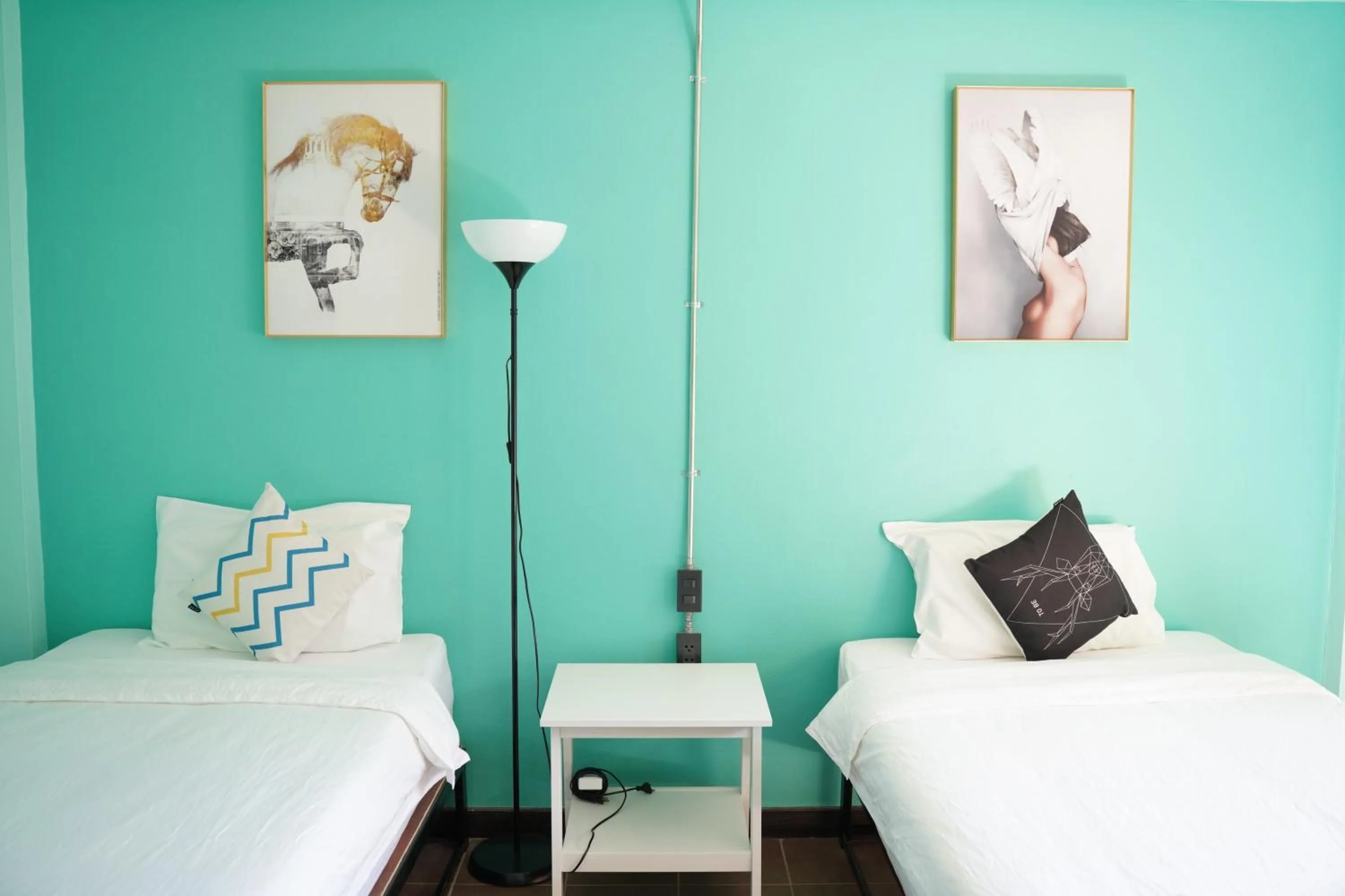 Bed in Elegant Lanna Guesthouse