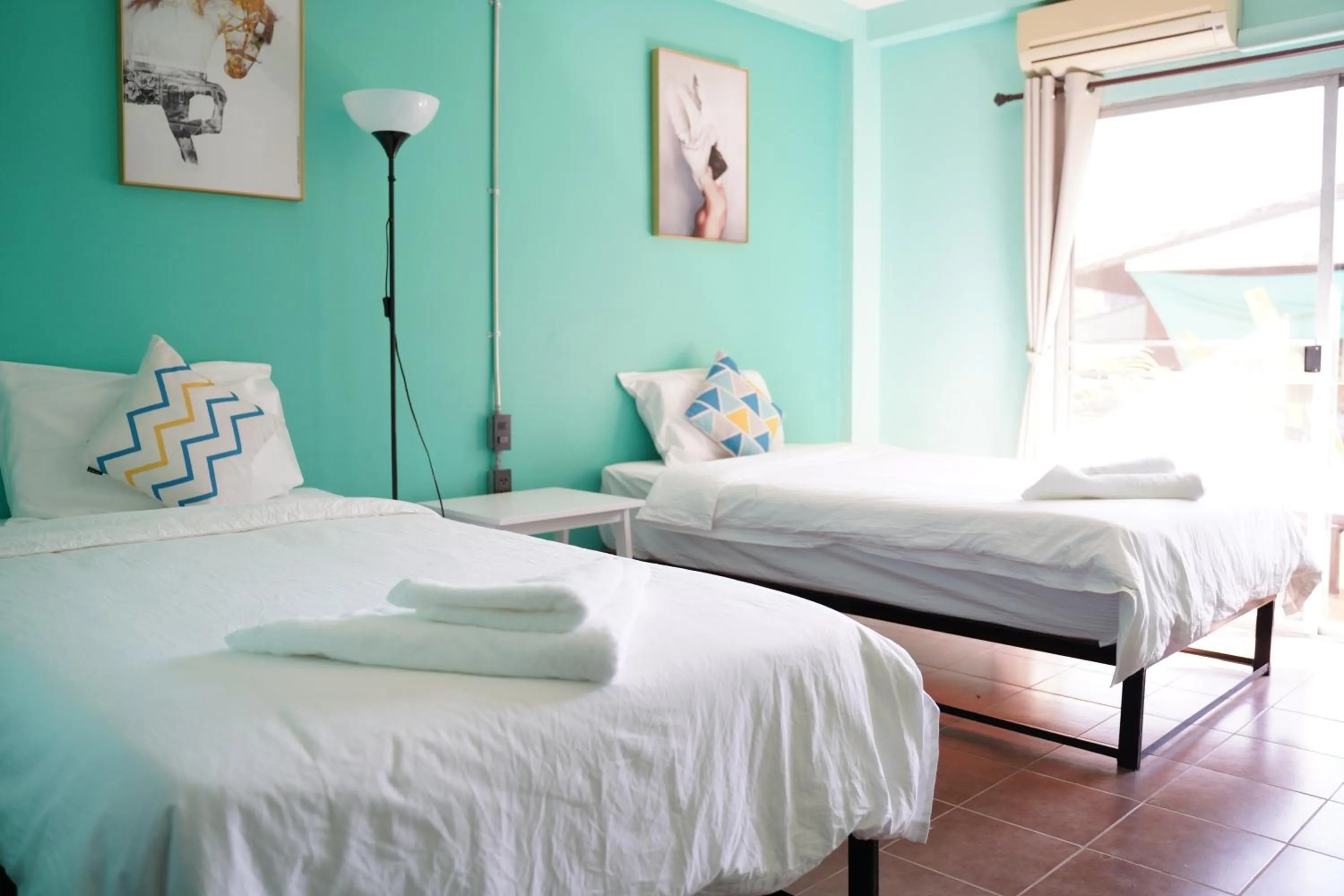 Bed in Elegant Lanna Guesthouse