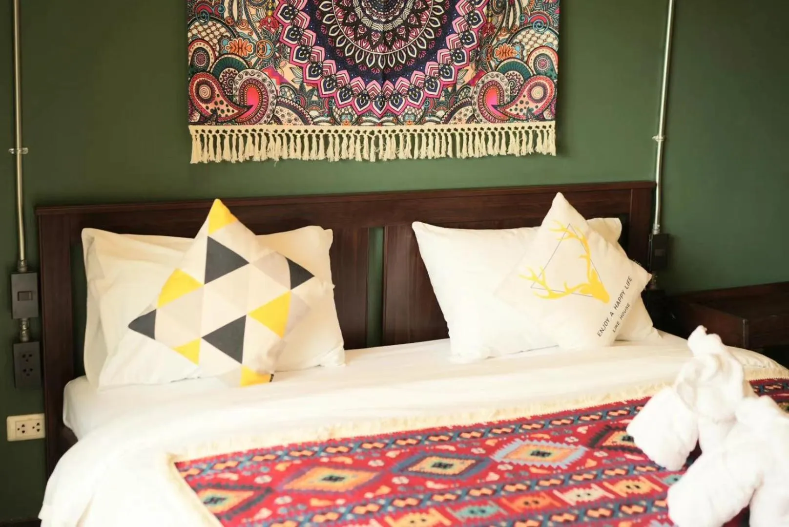 Bed in Elegant Lanna Guesthouse