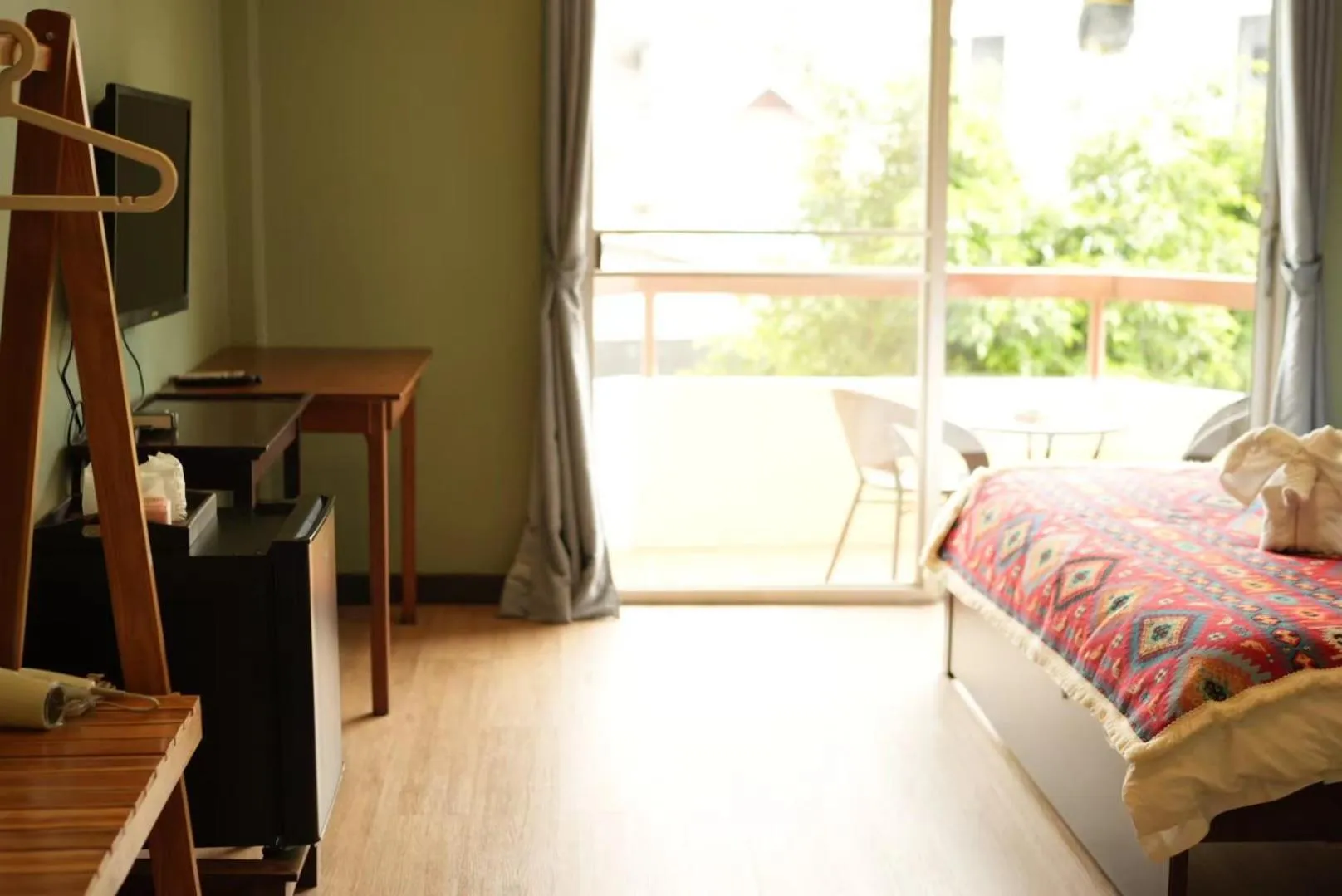 Bed in Elegant Lanna Guesthouse