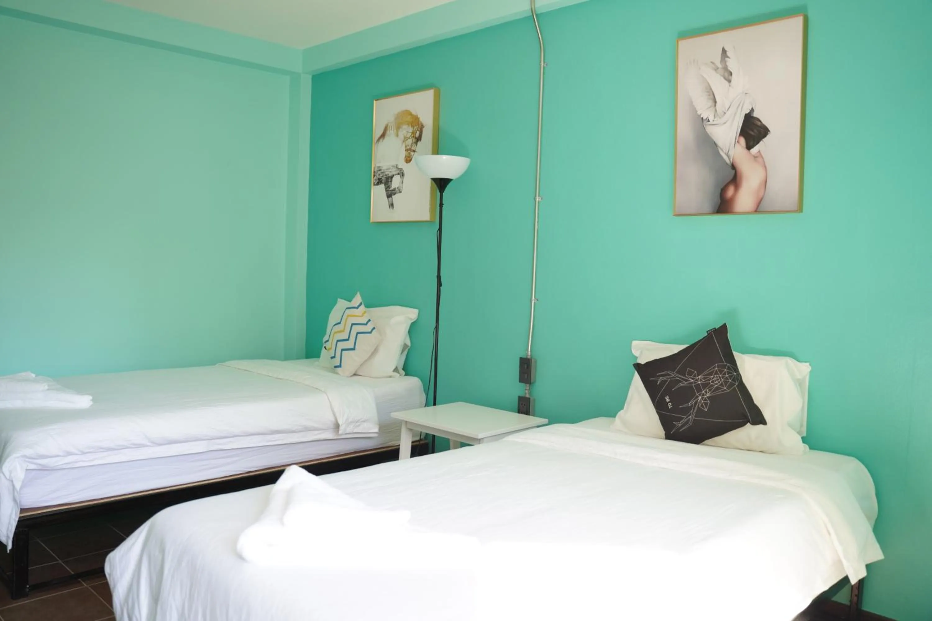 Bed in Elegant Lanna Guesthouse