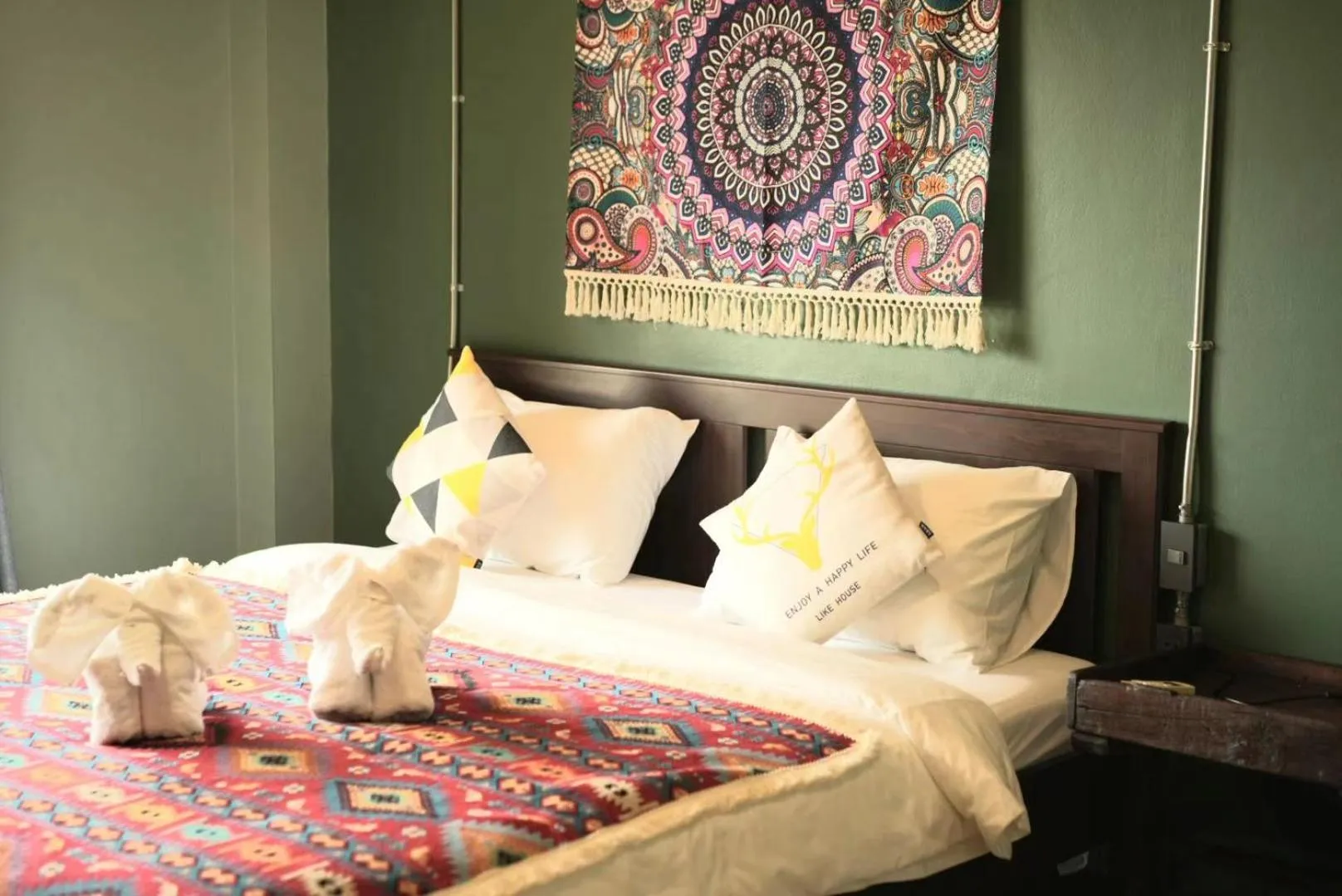 Bed in Elegant Lanna Guesthouse