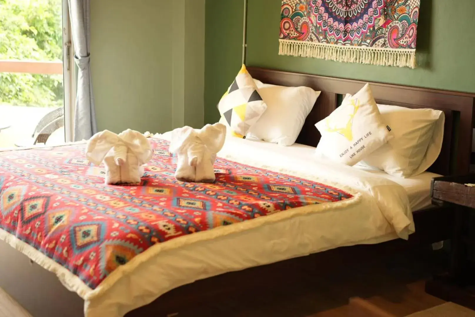 Bed in Elegant Lanna Guesthouse Bed in Elegant Lanna Guesthouse