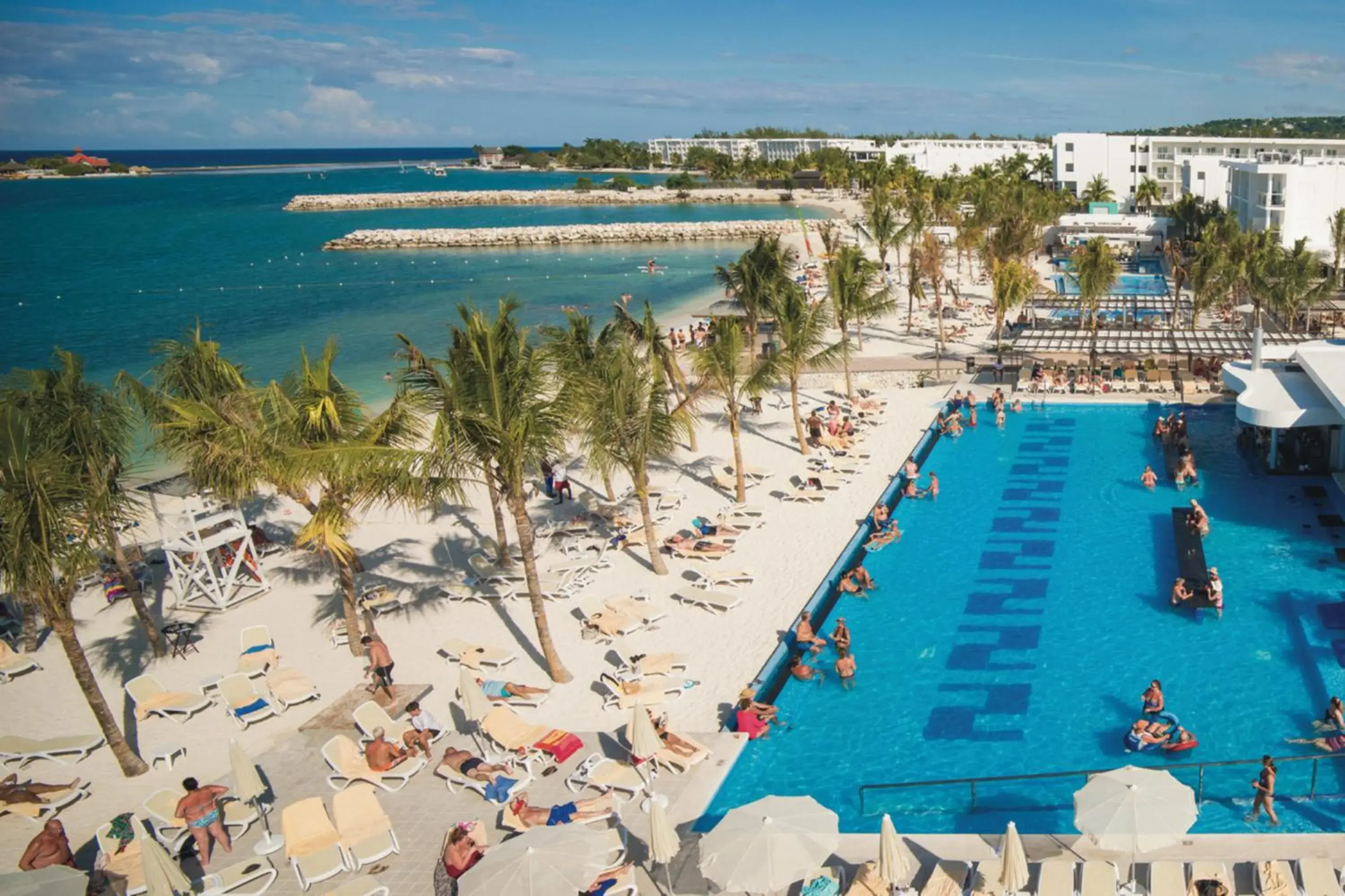 Swimming pool in Riu Reggae - Adults Only - All Inclusive Swimming pool in Riu Reggae - Adults Only - All Inclusive