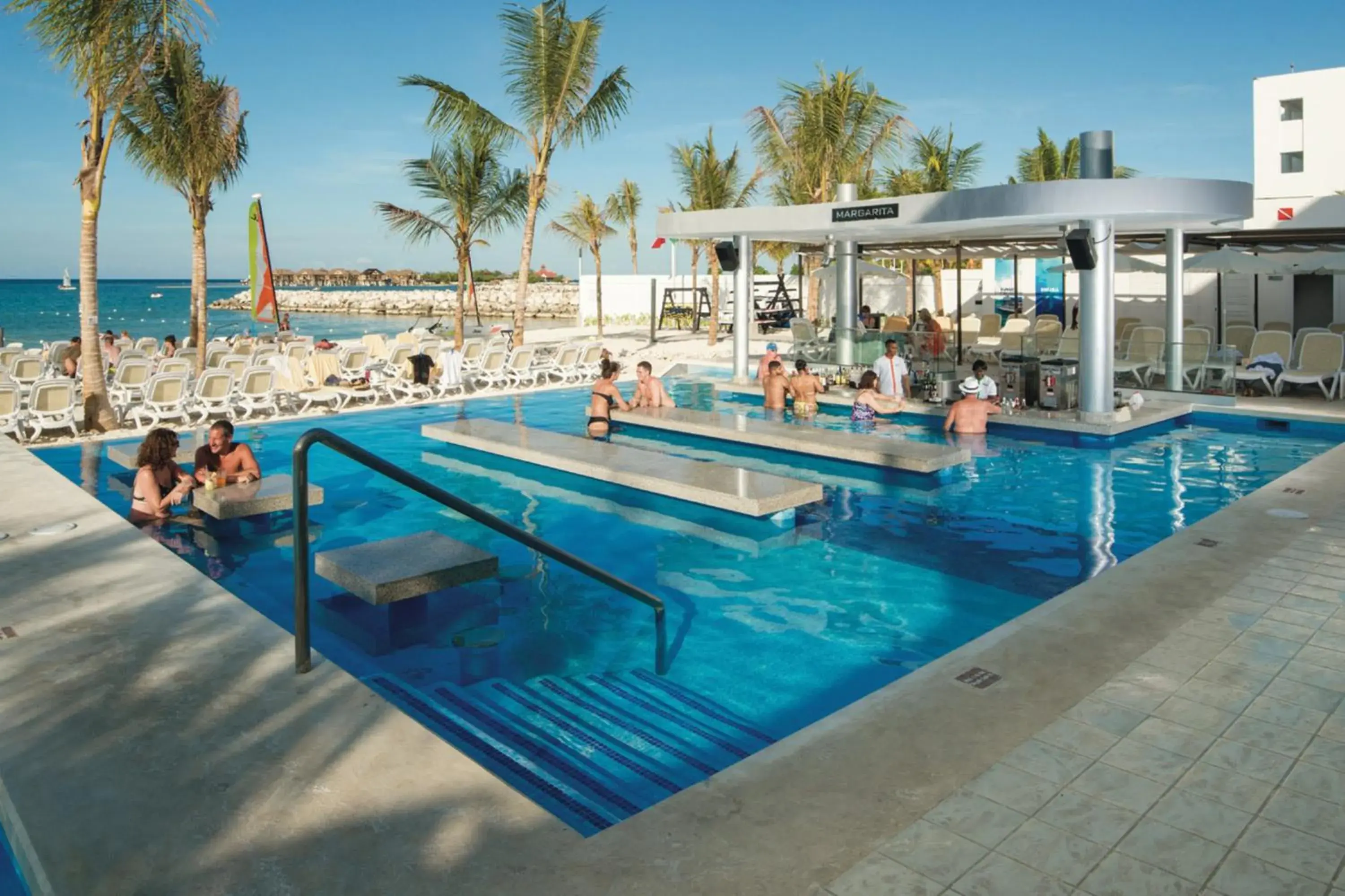 Swimming pool in Riu Reggae - Adults Only - All Inclusive Swimming pool in Riu Reggae - Adults Only - All Inclusive
