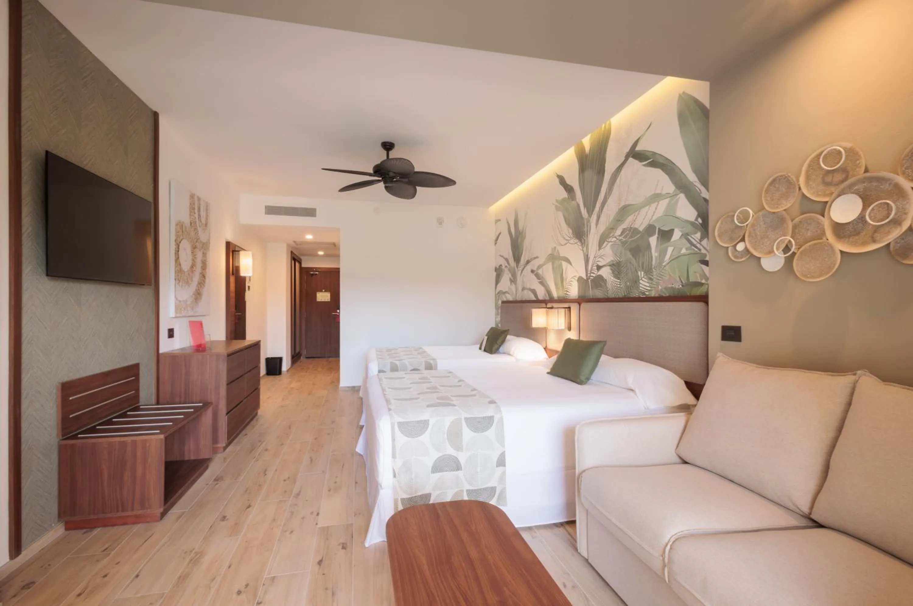 Living room, Bed in Riu Guanacaste - All Inclusive