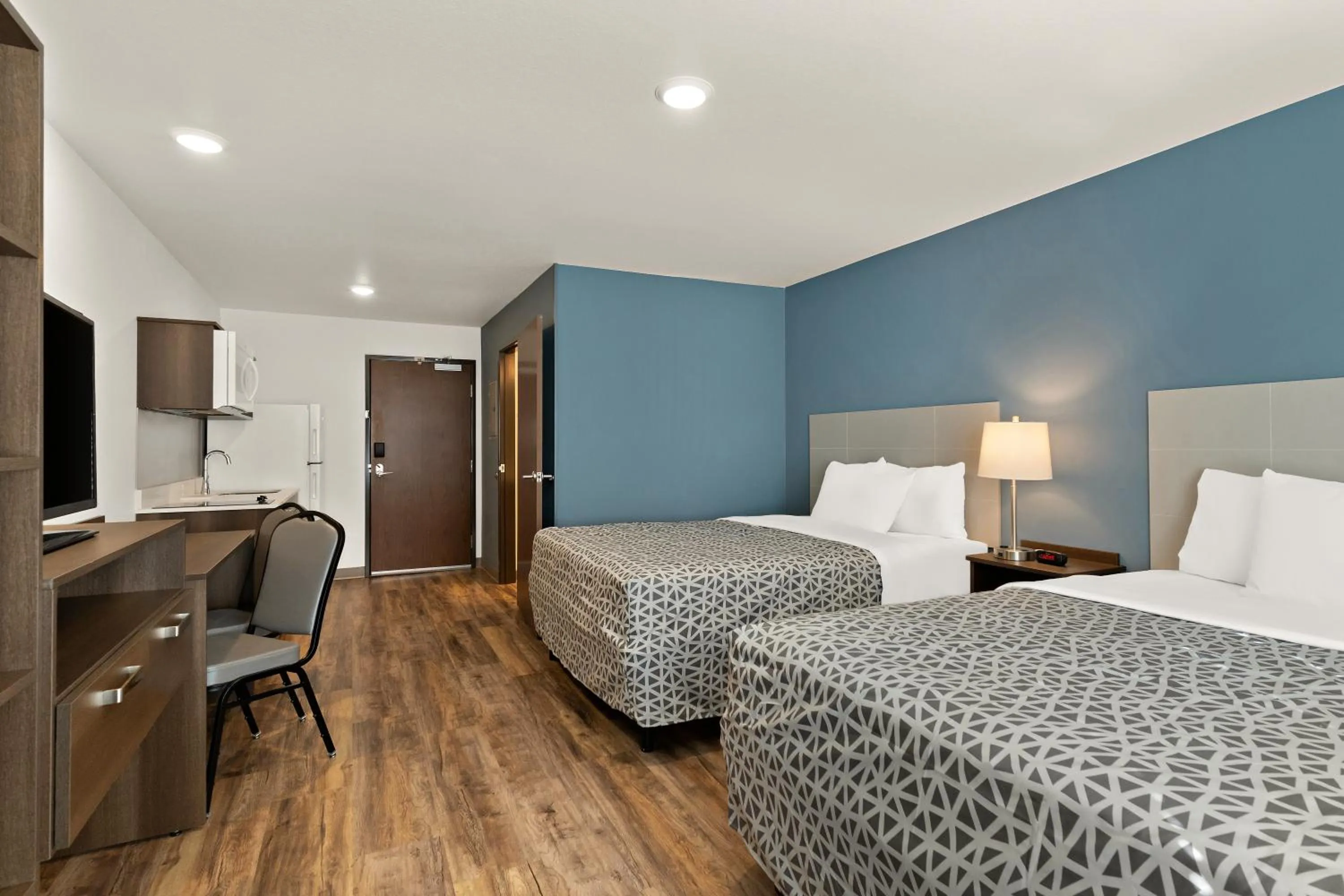 Bedroom in WoodSpring Suites Fort Collins