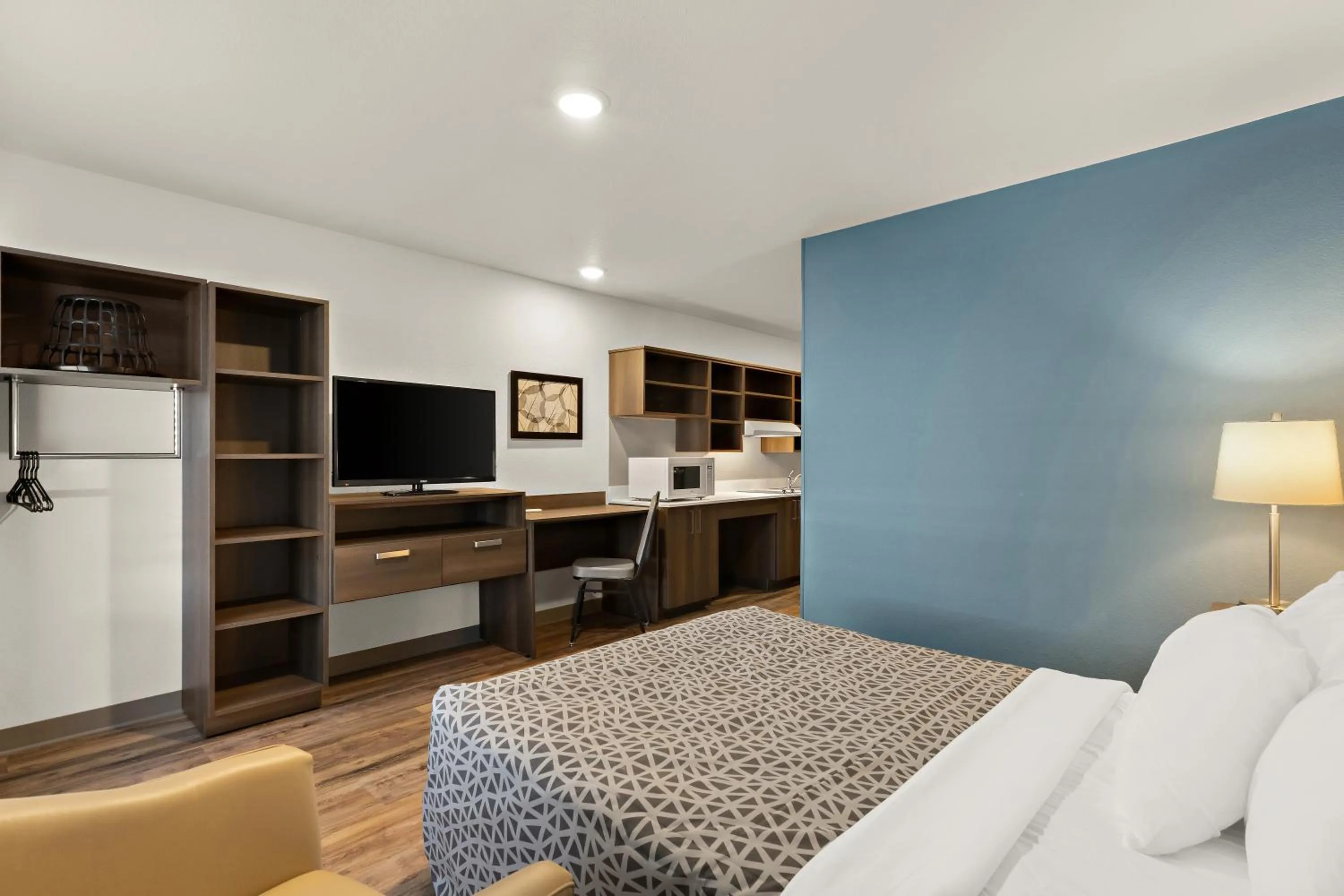 Bedroom in WoodSpring Suites Fort Collins