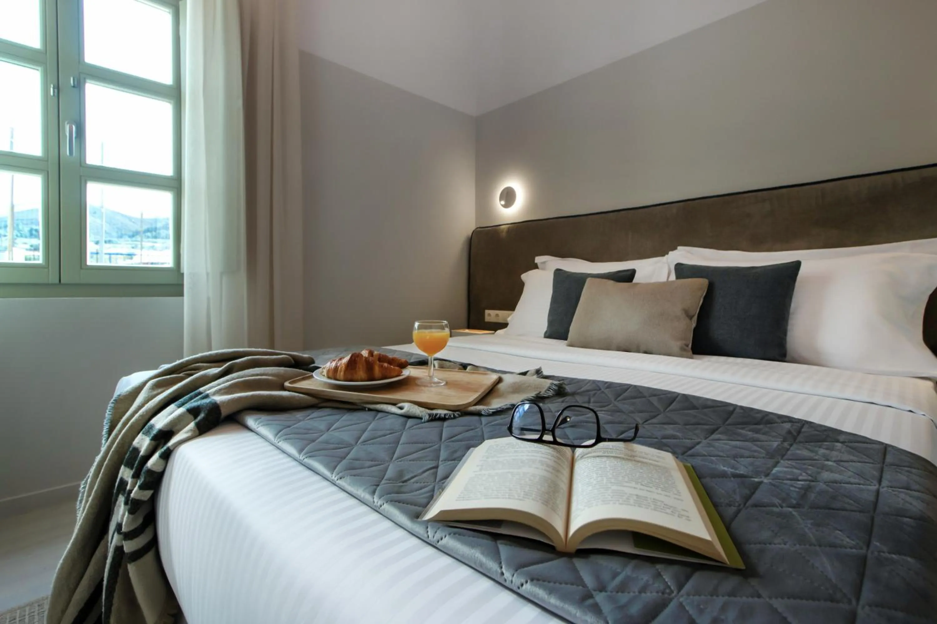 Bed in Octavia Rooms