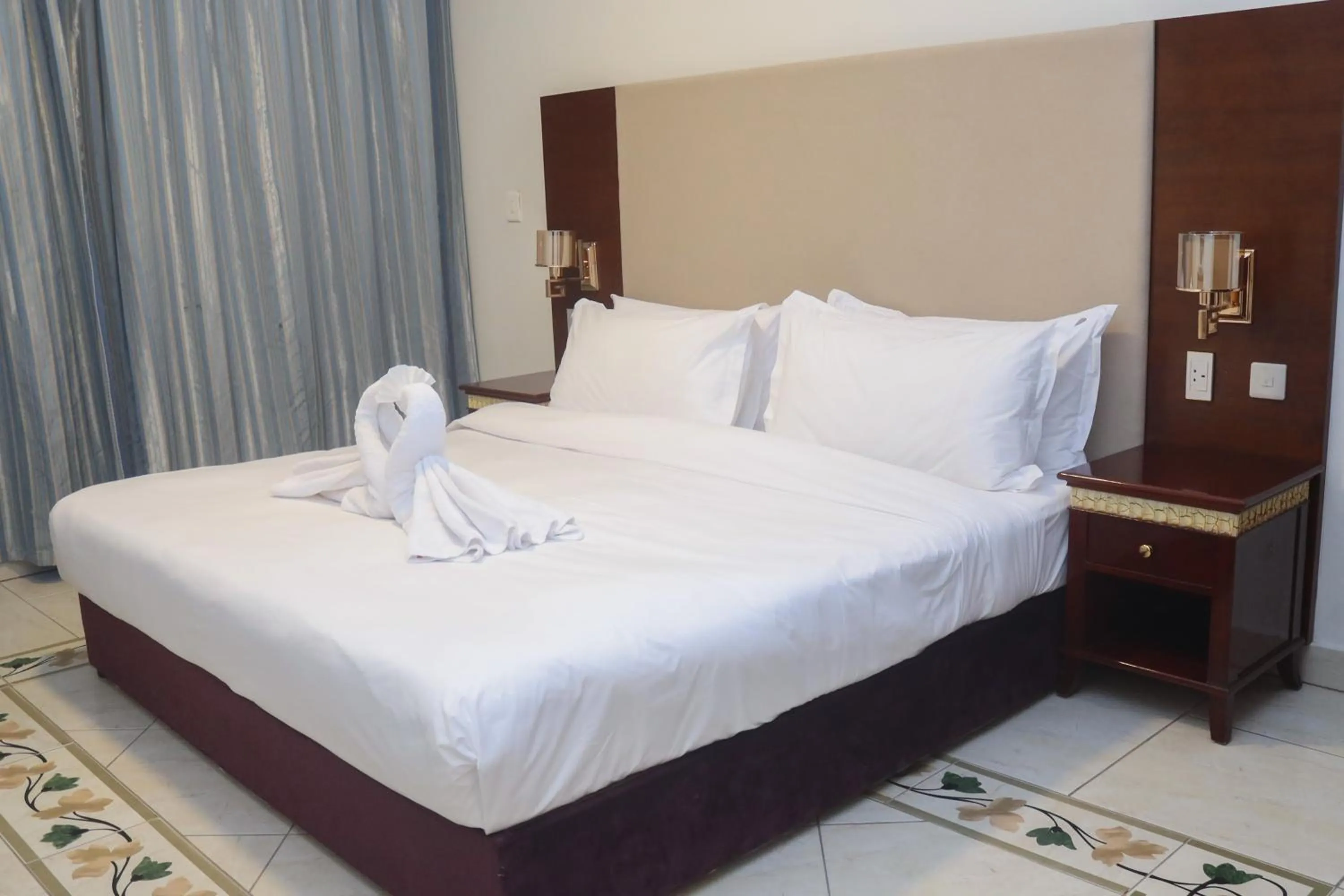 Bed in Radwa Ramada Resort