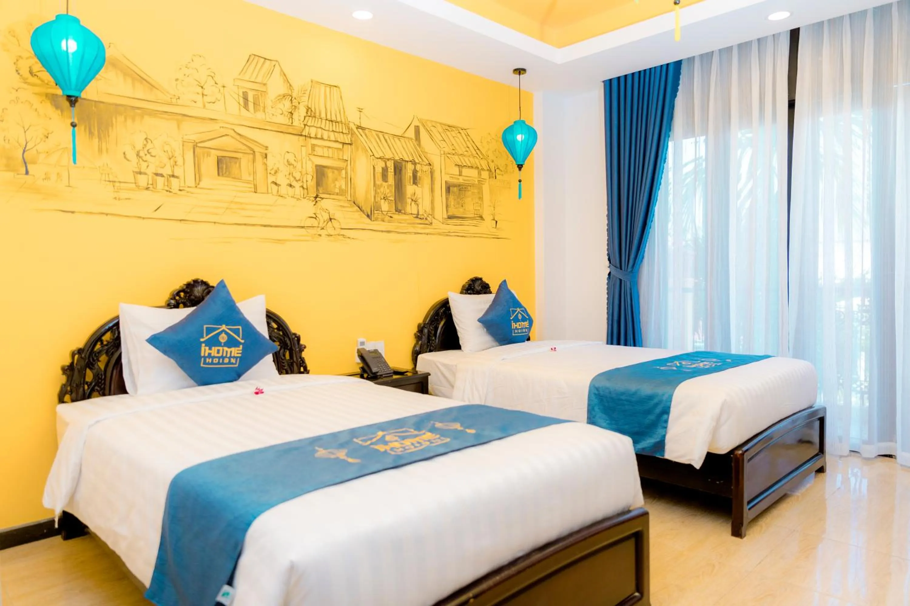 Photo of the whole room, Bed in iHome Hoi An