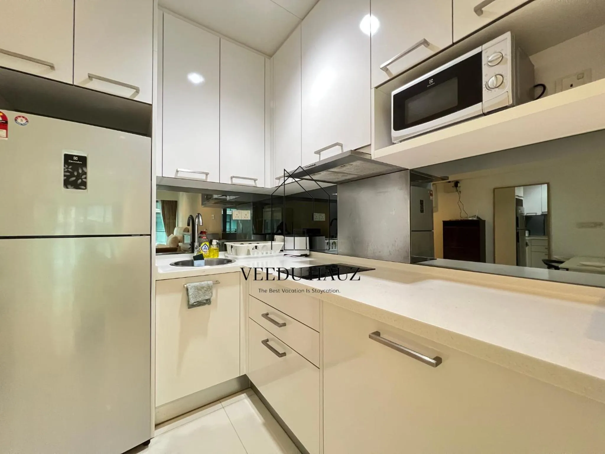 Kitchen or kitchenette in Mercu Summer Suites KLCC by Veedu Hauz