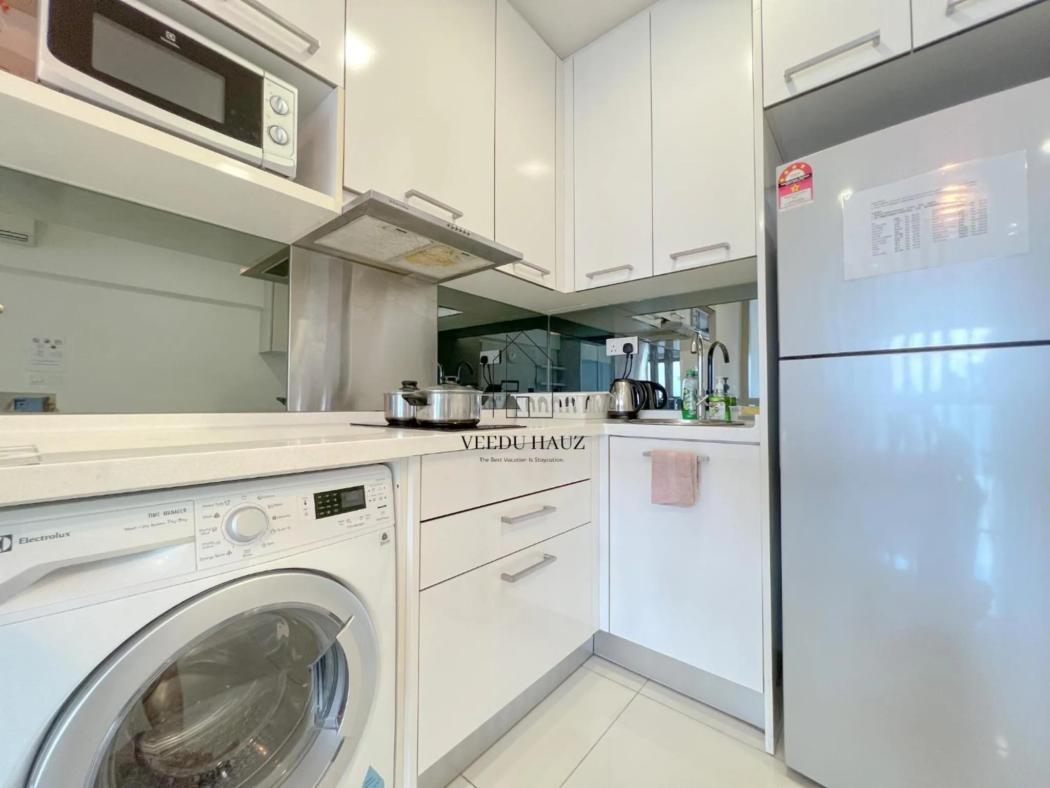 Kitchen or kitchenette in Mercu Summer Suites KLCC by Veedu Hauz