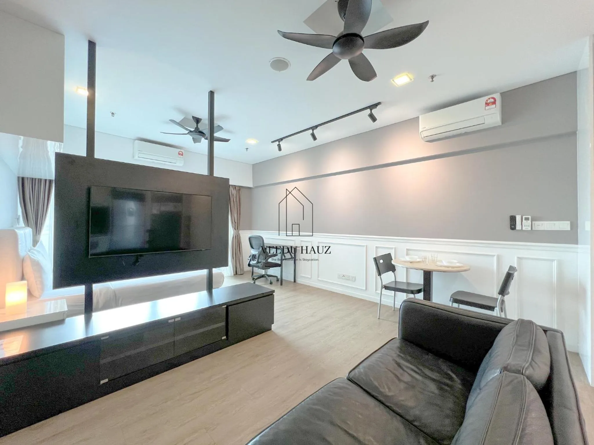 Communal lounge/ TV room in Mercu Summer Suites KLCC by Veedu Hauz