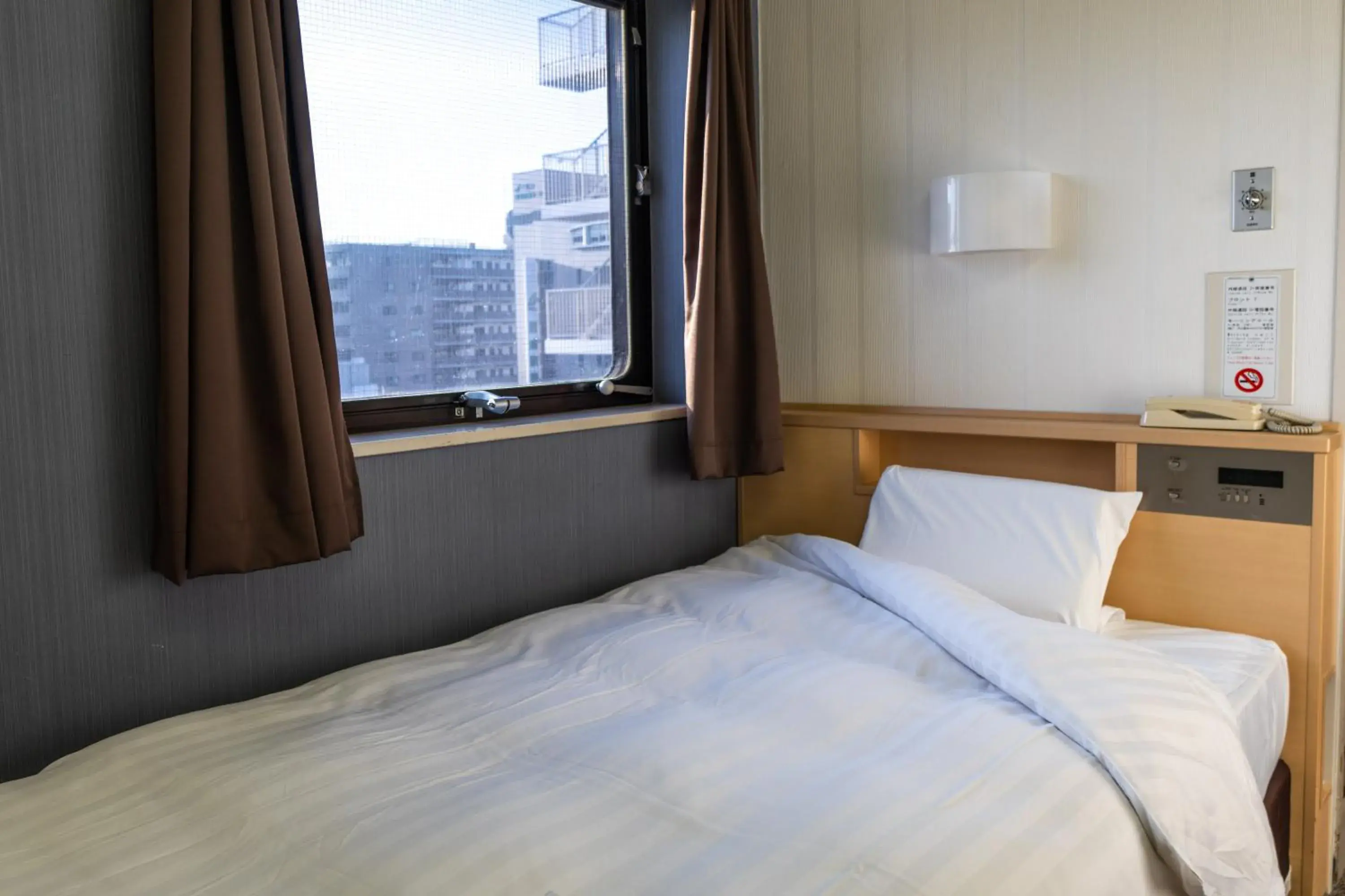 Bed in Ramada Encore by Wyndham Amagasaki Bed in Ramada Encore by Wyndham Amagasaki