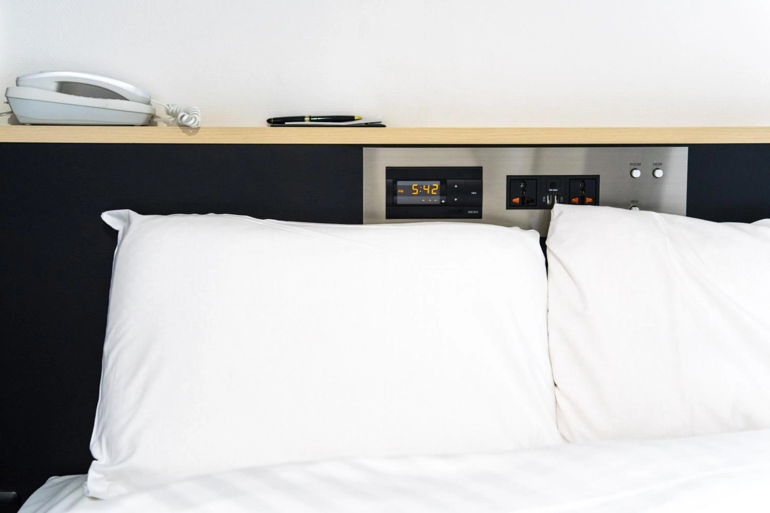 Bed in Ramada Encore by Wyndham Amagasaki