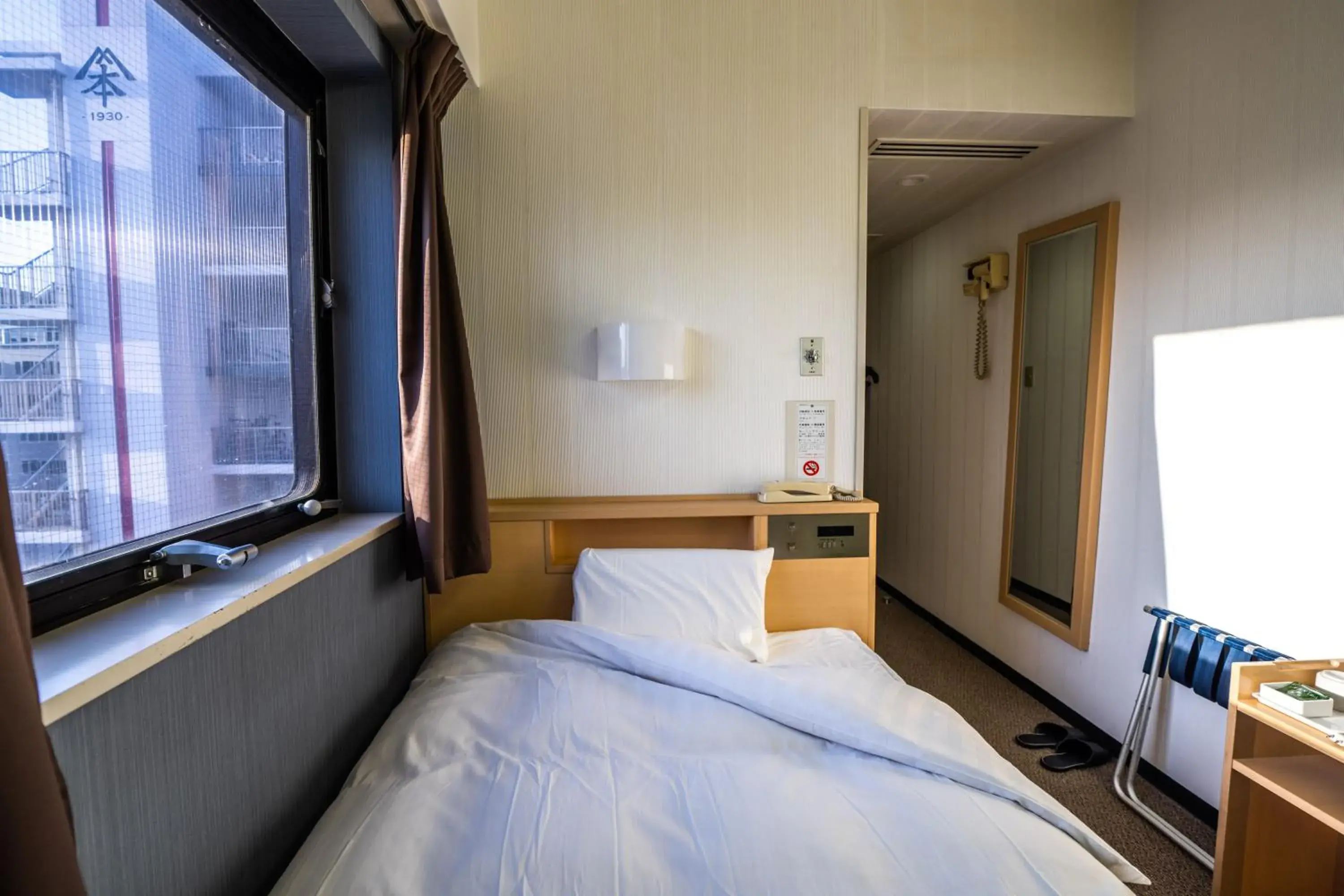 Bed in Ramada Encore by Wyndham Amagasaki Bed in Ramada Encore by Wyndham Amagasaki