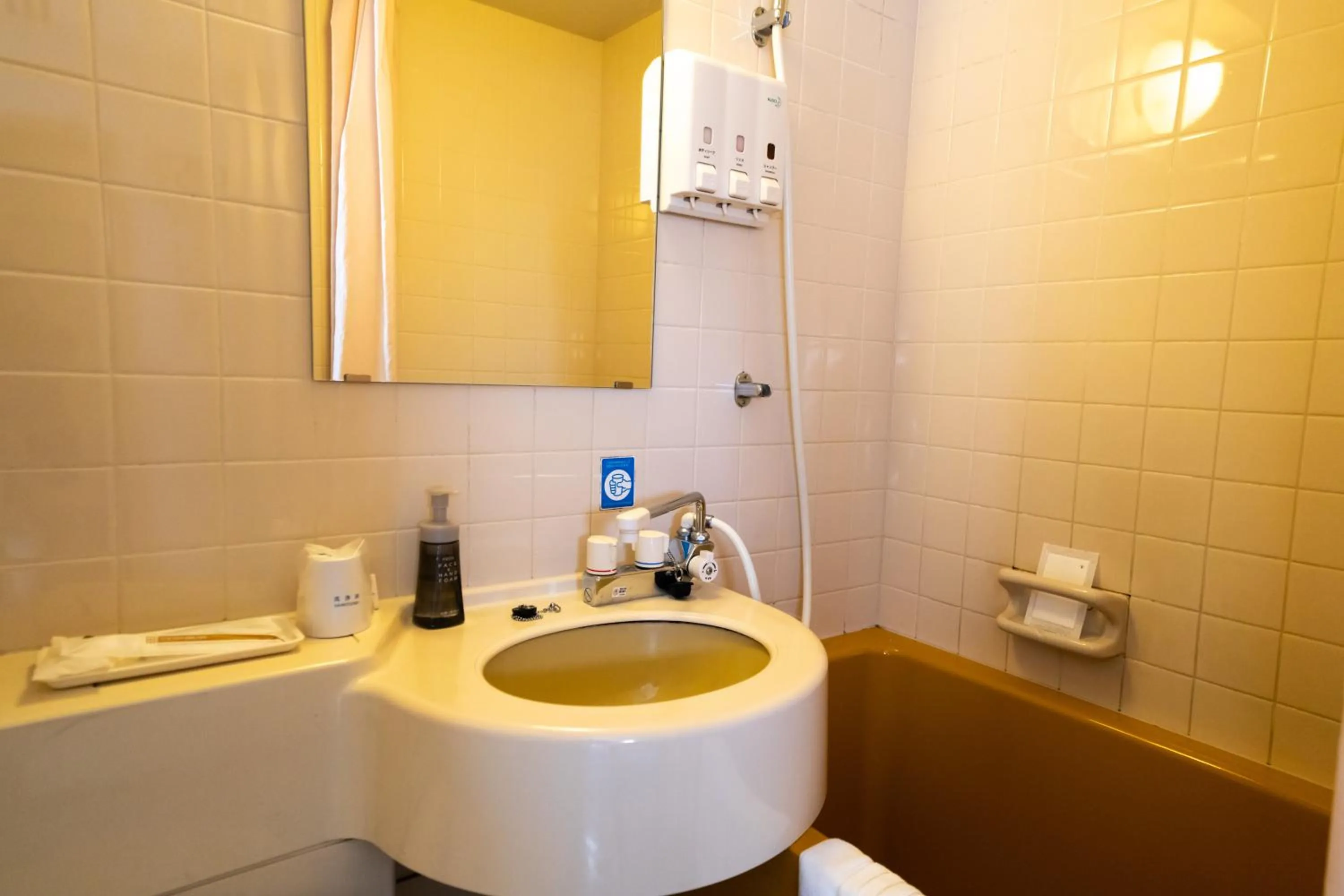 Shower in Ramada Encore by Wyndham Amagasaki