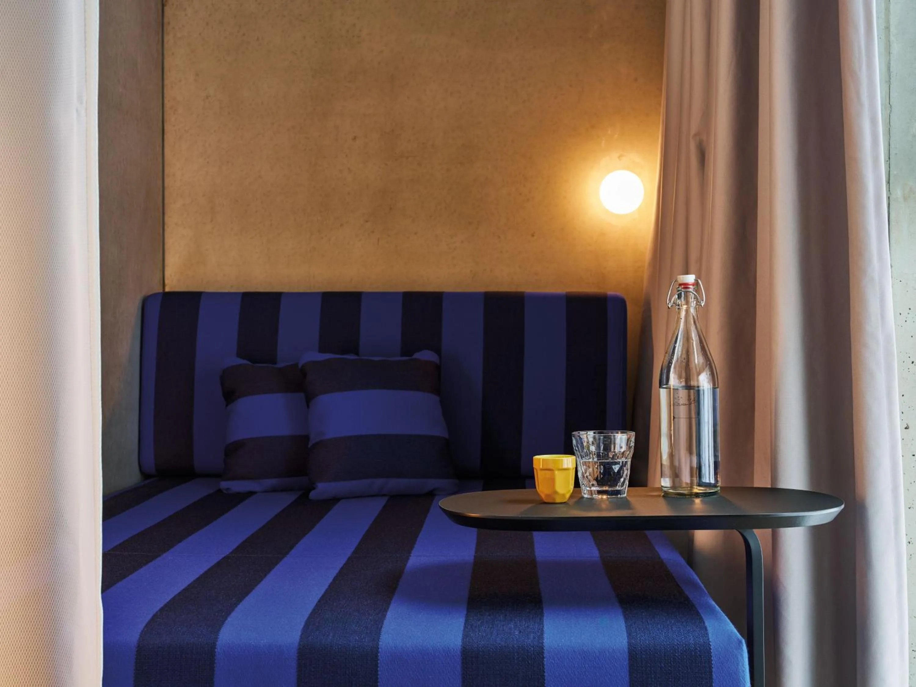 Living room, Bed in Urban Nature Bad Gastein - Badeschloss