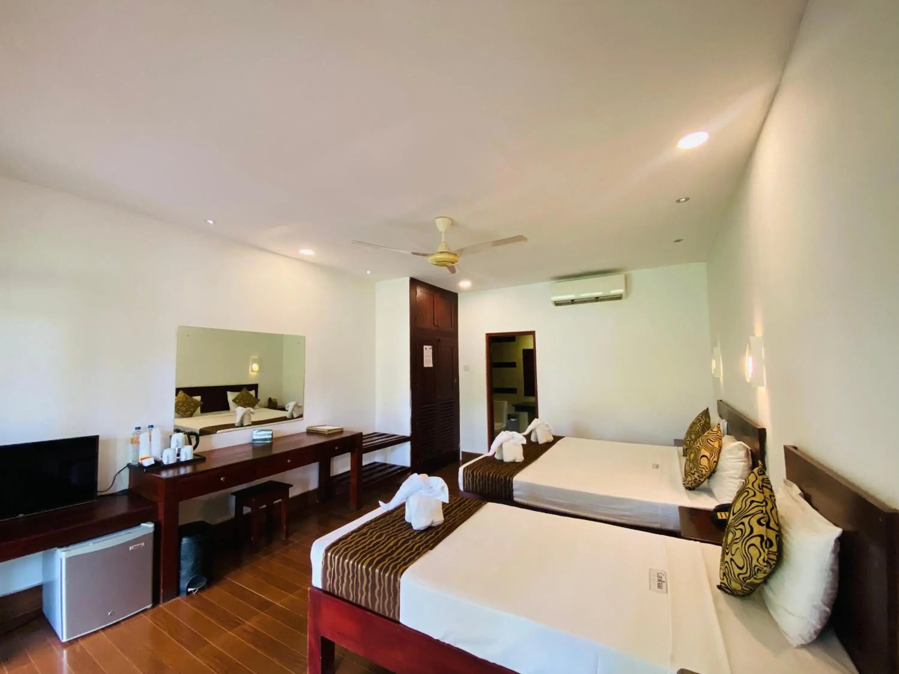 Deluxe Triple Room in Carolina Beach Resort & Spa Deluxe Triple Room in Carolina Beach Resort & Spa