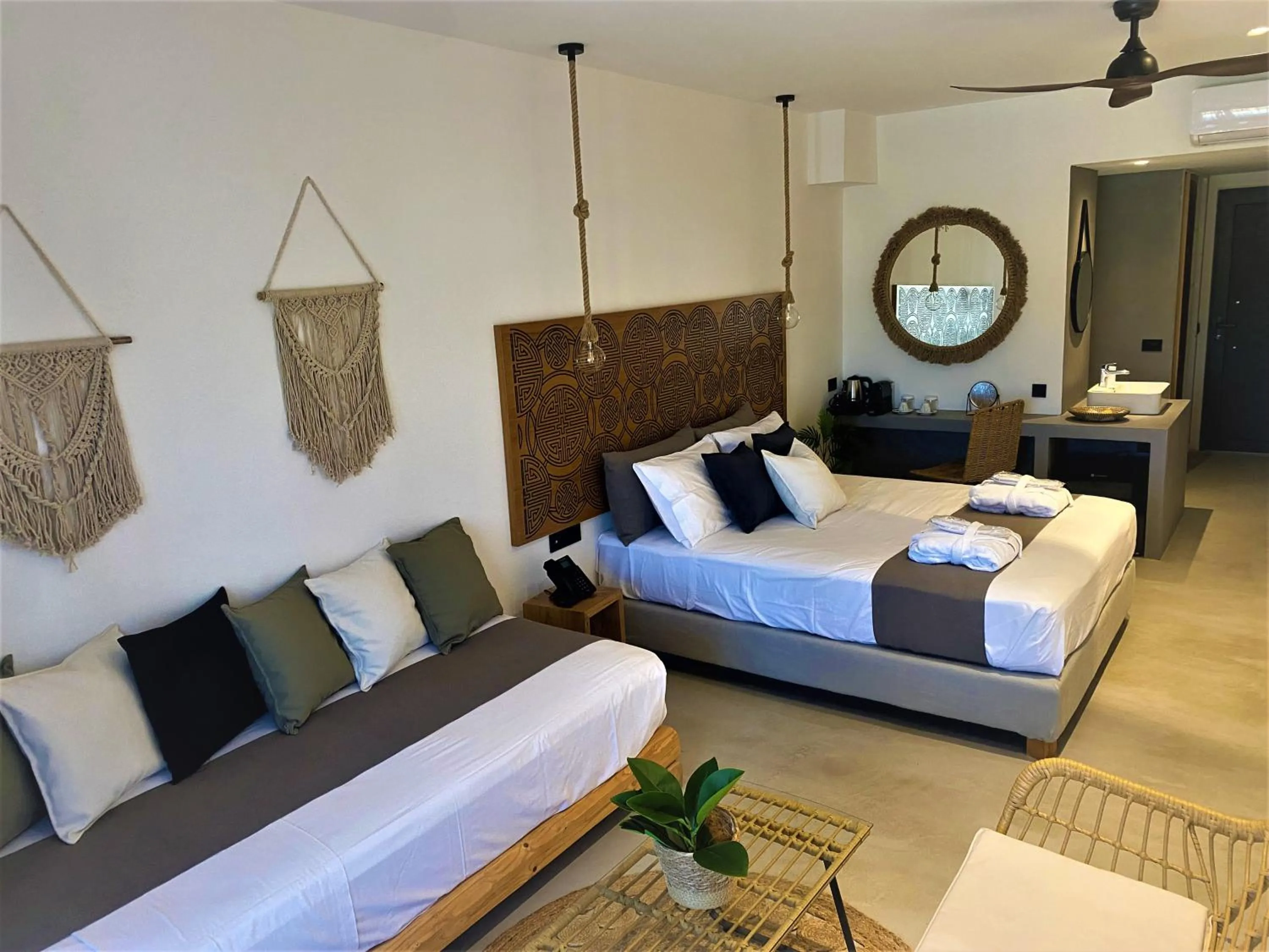 Bed in Helios Beach Hotel & Bungalows