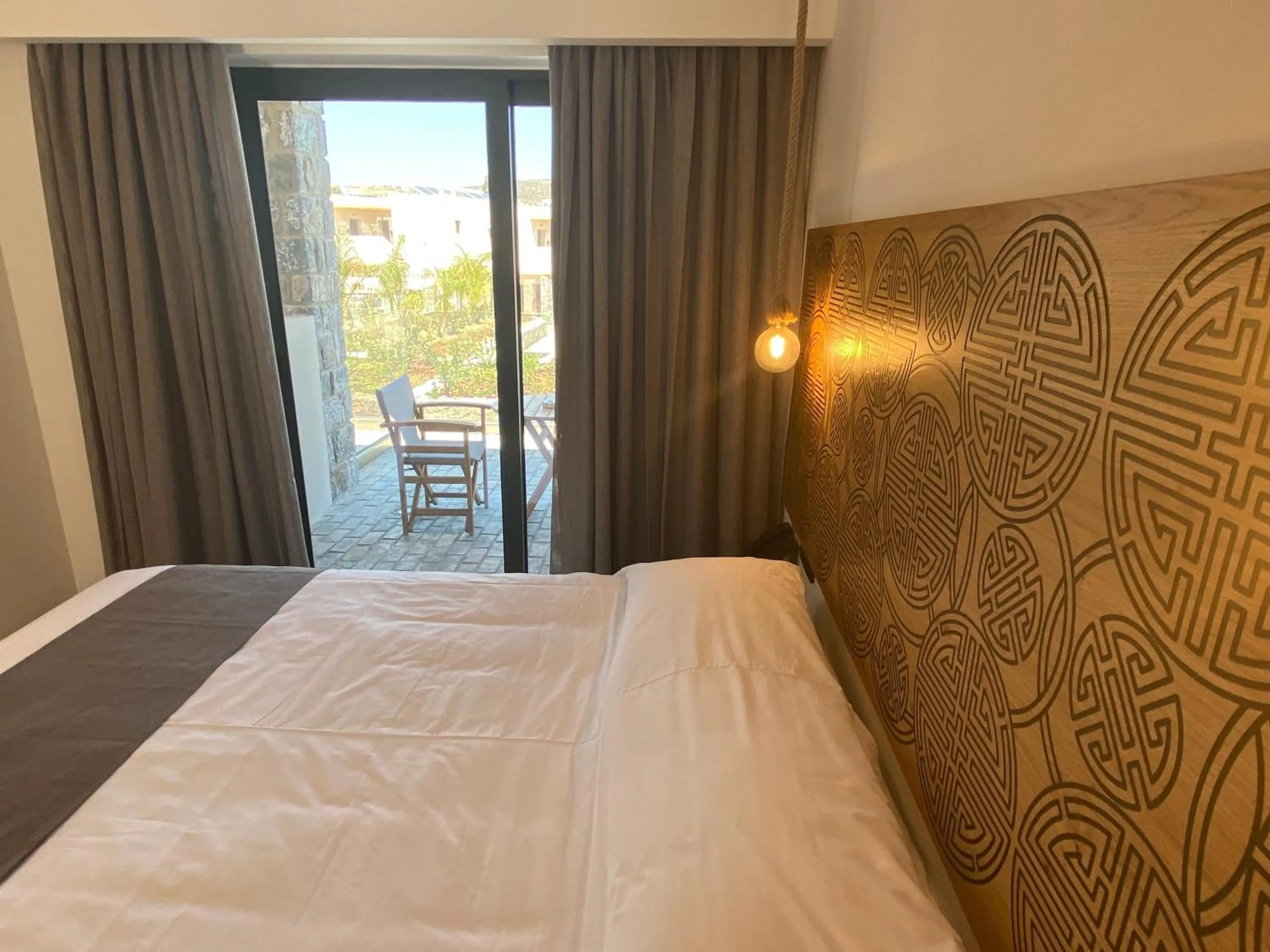 Bed in Helios Beach Hotel & Bungalows