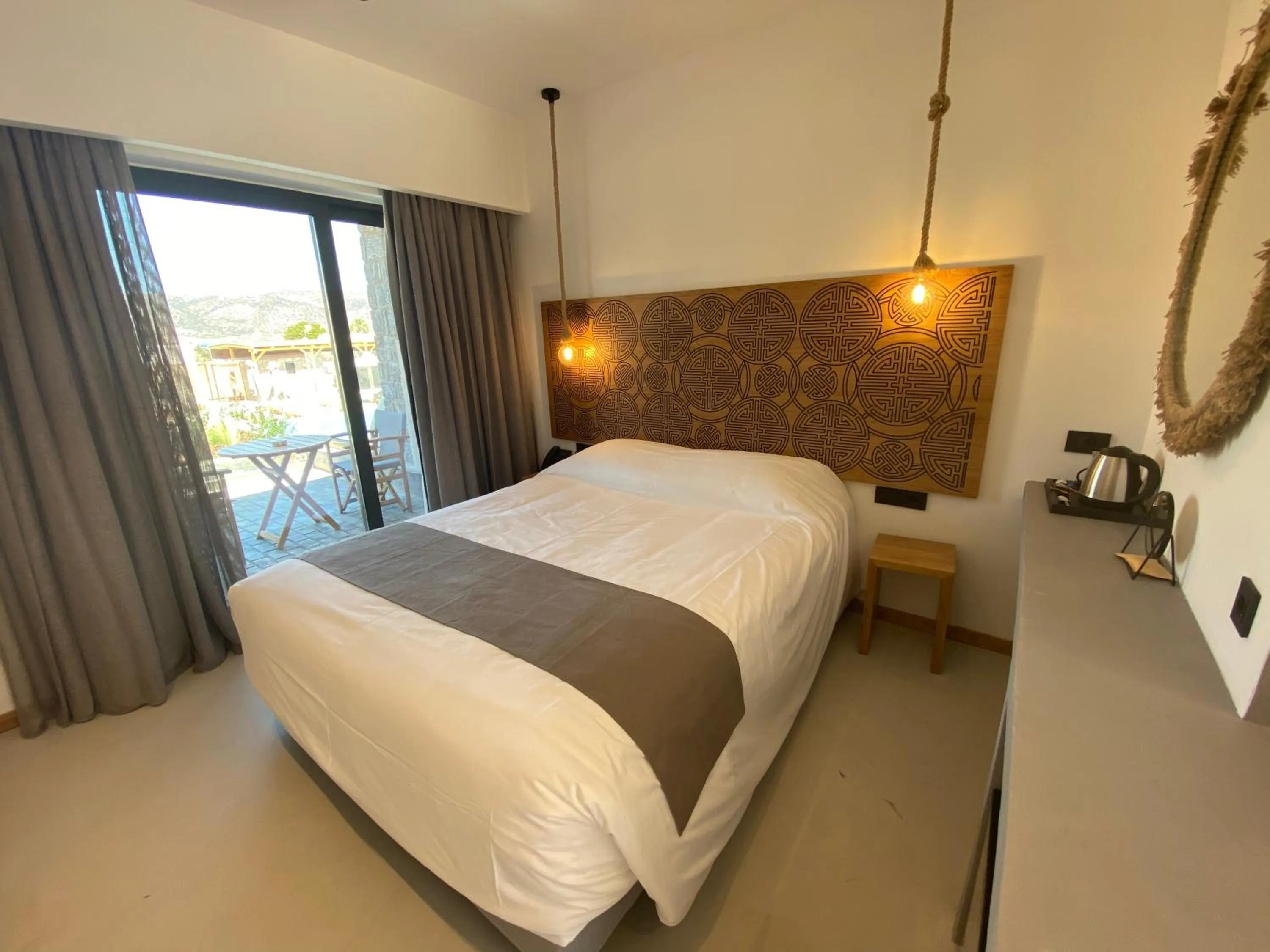 Bed in Helios Beach Hotel & Bungalows