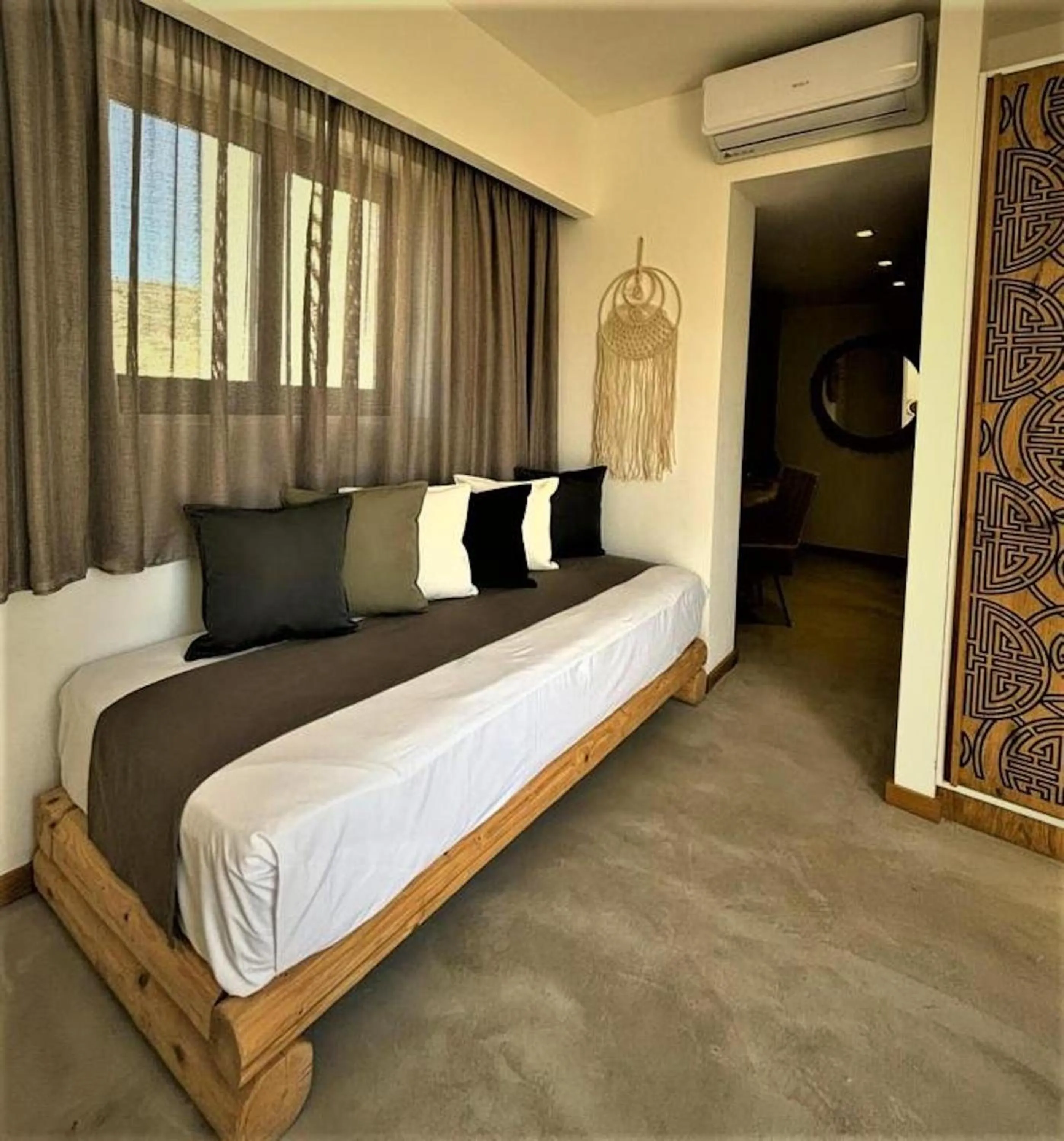 Bed in Helios Beach Hotel & Bungalows