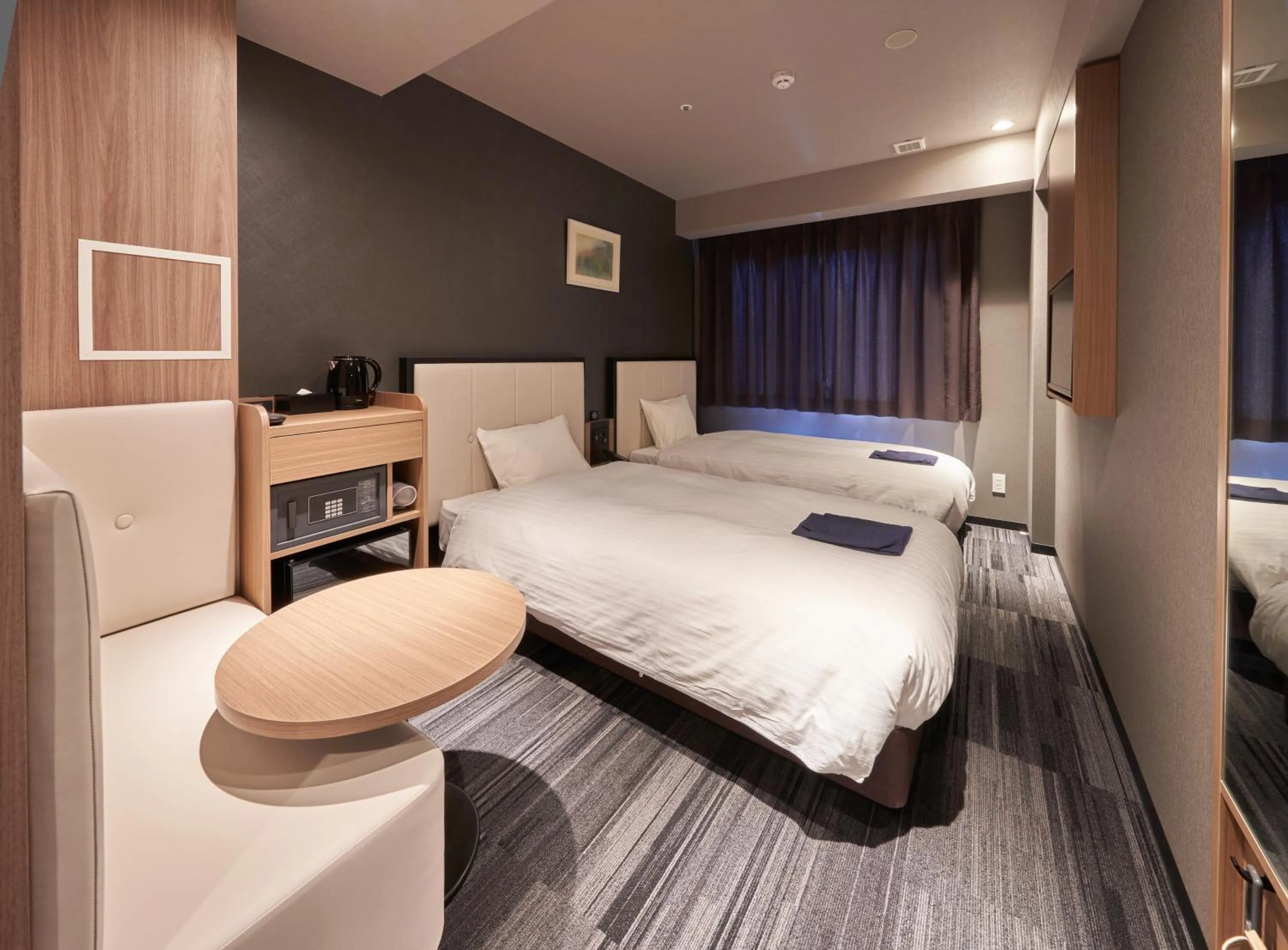 Photo of the whole room, Bed in Welina Hotel Premier Nakanoshima West