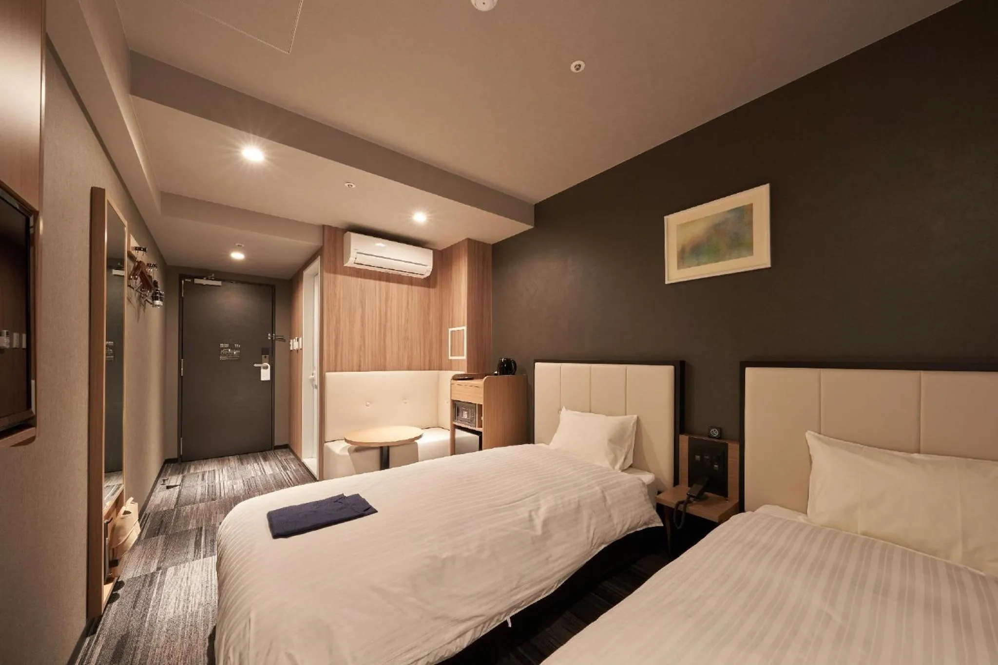 Photo of the whole room, Bed in Welina Hotel Premier Nakanoshima West