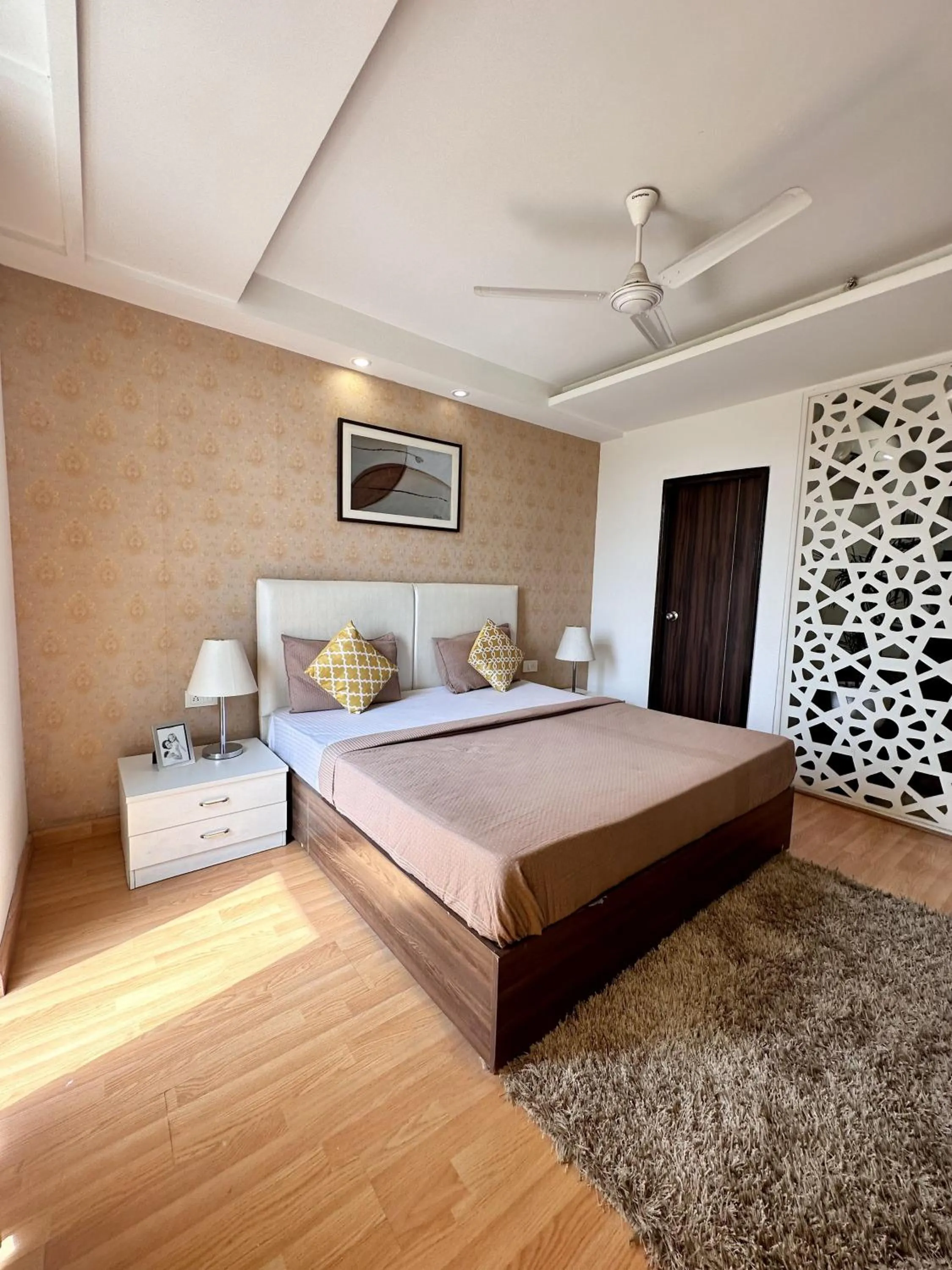 Photo of the whole room, Bed in Flamingo Hotel Sector 67 I Studio Rooms I Gurgaon