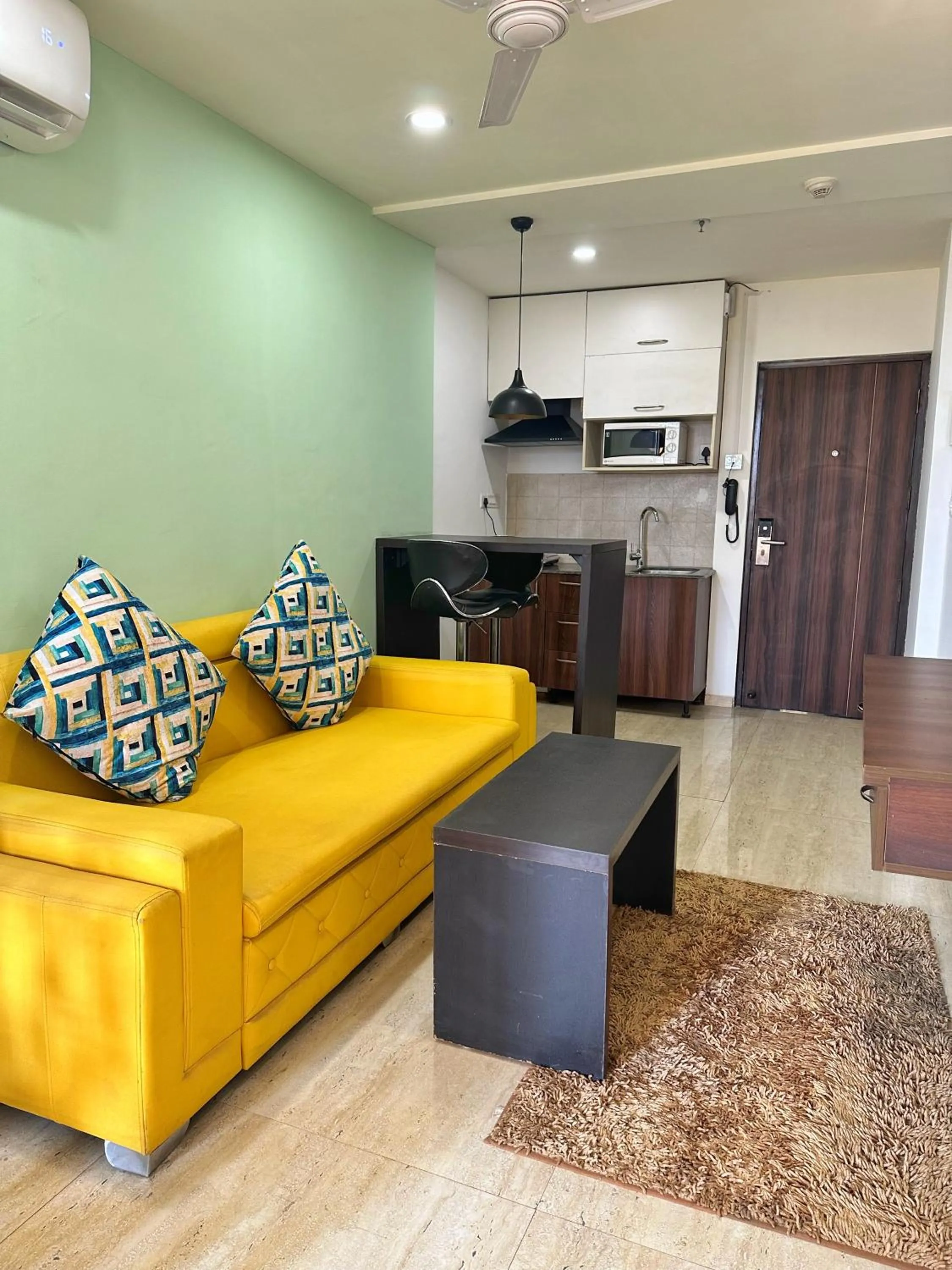 Living room in Flamingo Hotel Sector 67 I Studio Rooms I Gurgaon