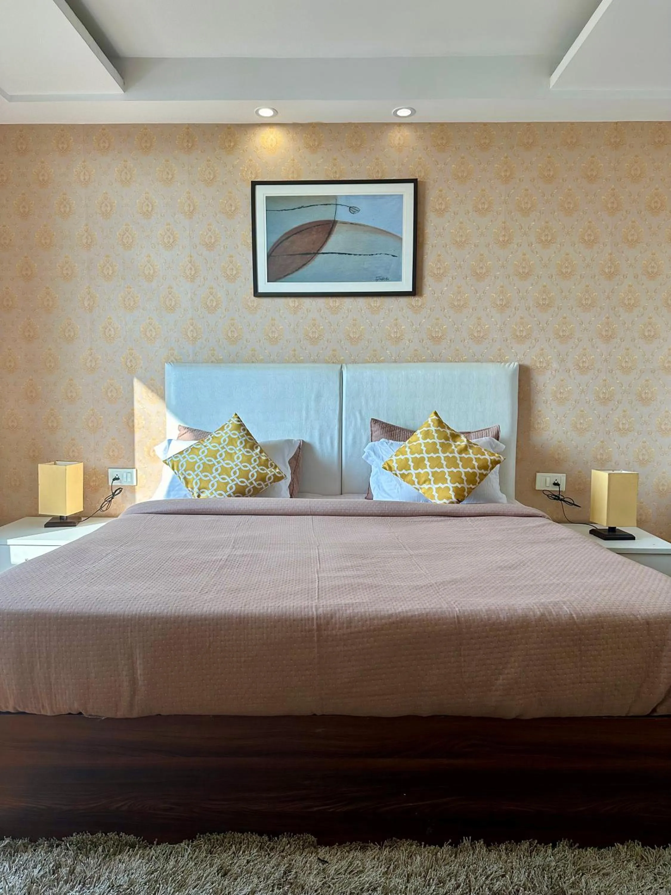 Bed in Flamingo Hotel Sector 67 I Studio Rooms I Gurgaon