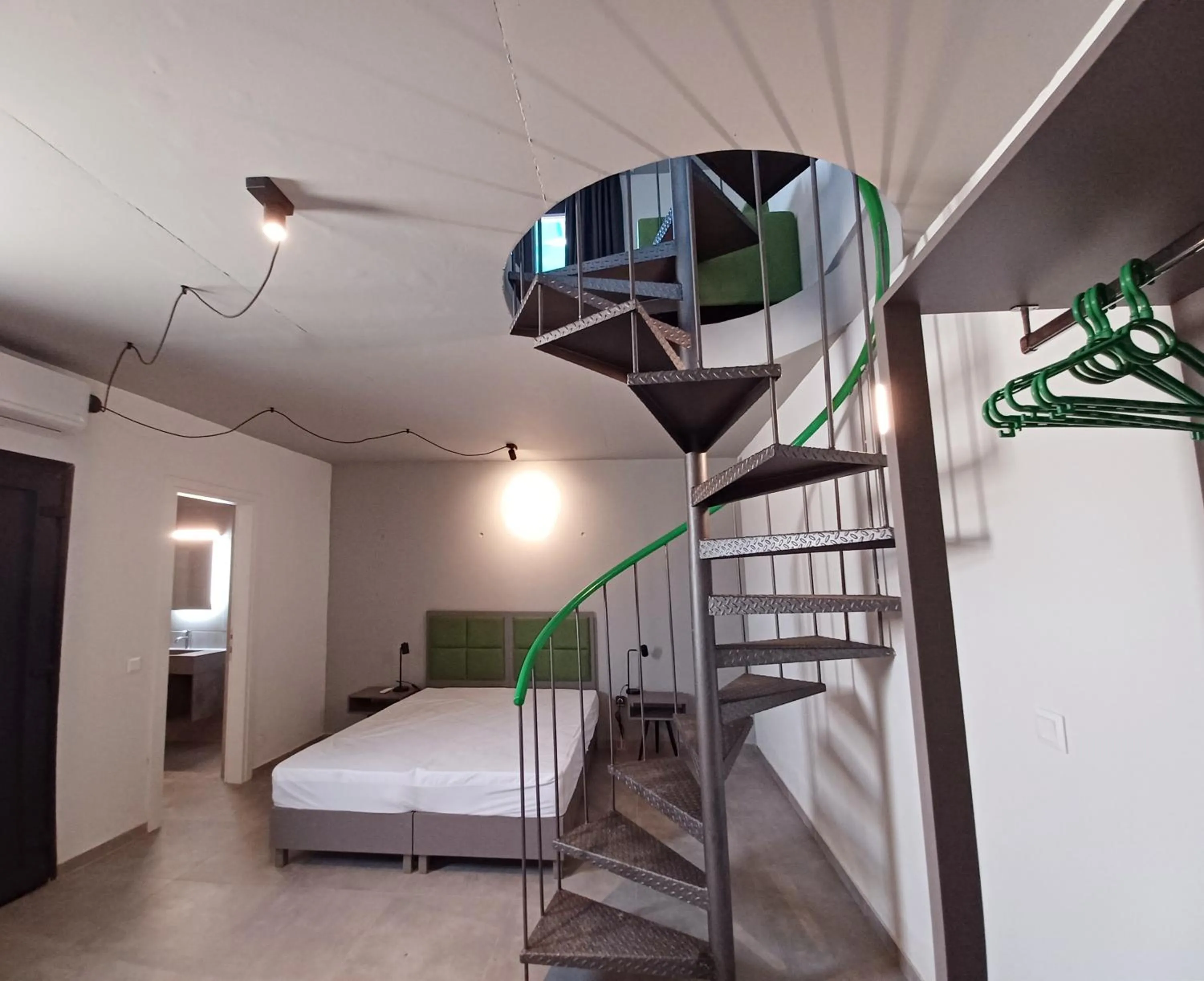Bedroom, Bed in Aurora Suites
