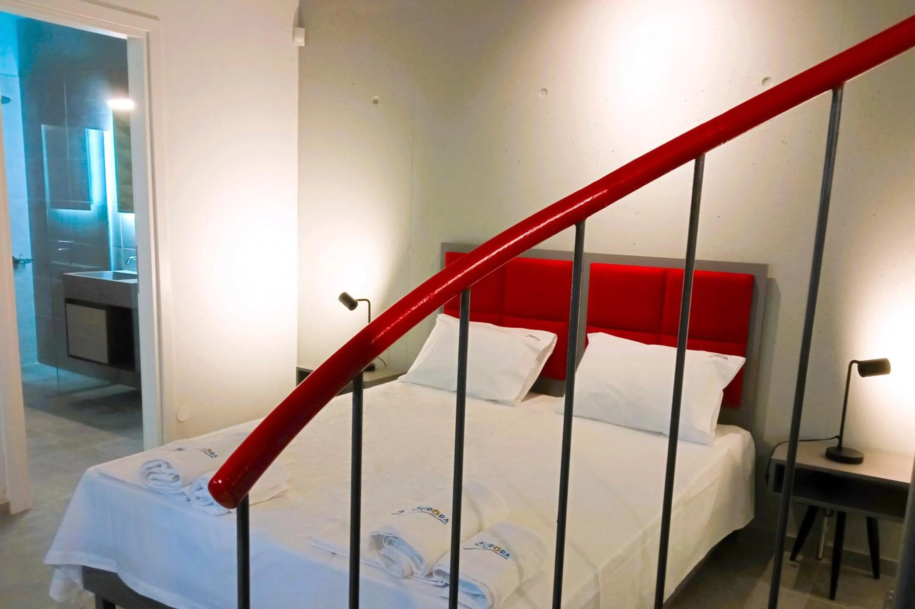Bathroom, Bed in Aurora Suites