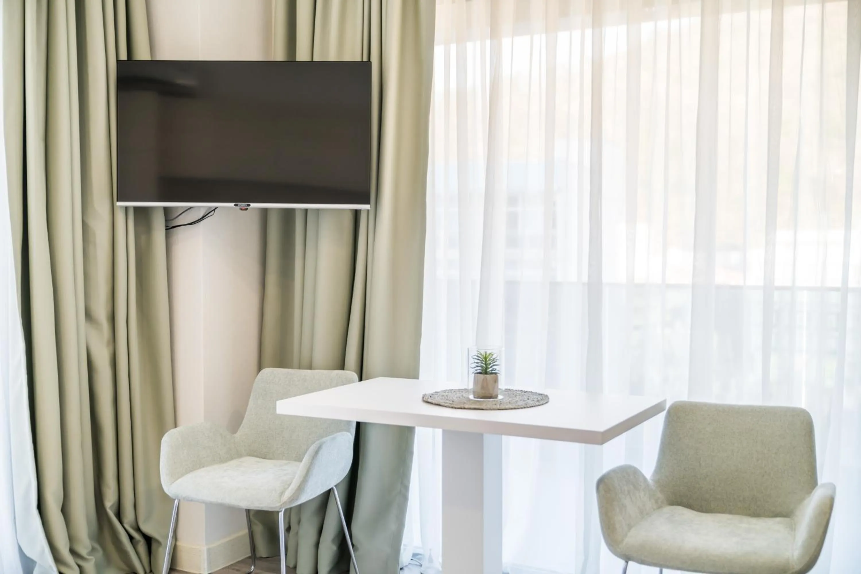 Living room in Green Side Apart Hotel