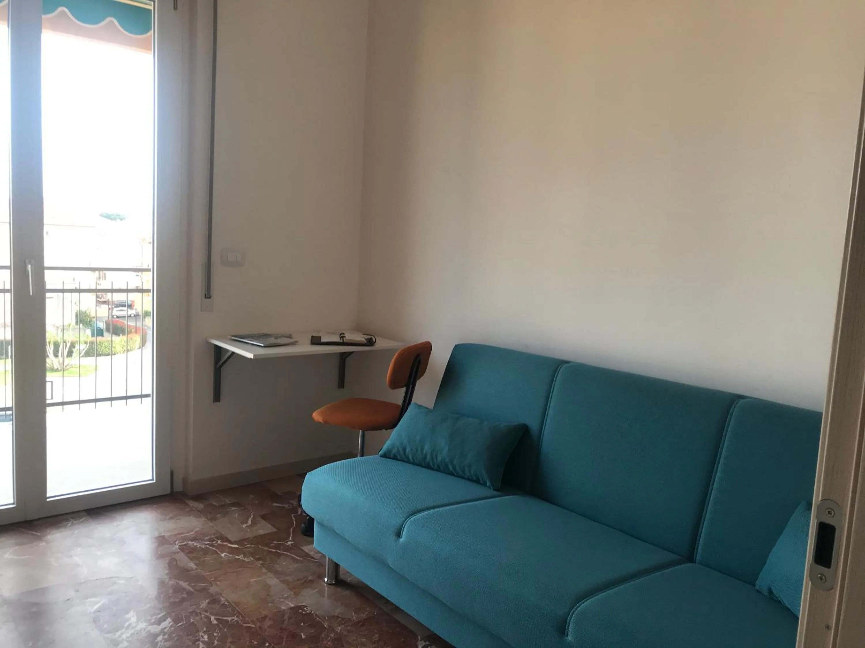 Living room in Appartamento Bianco by Holiday World
