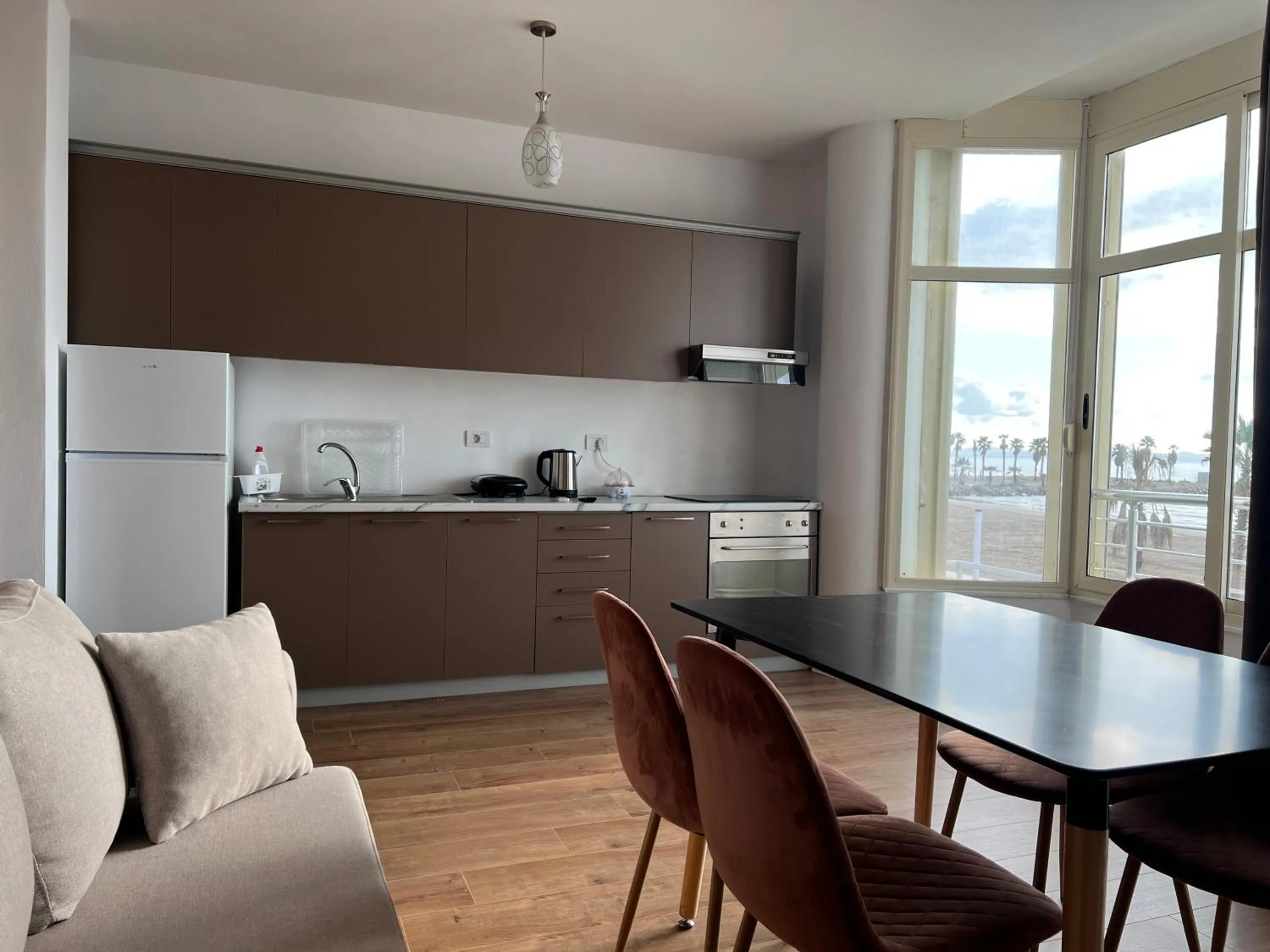 Kitchen or kitchenette in Wave Beachfront Apartments