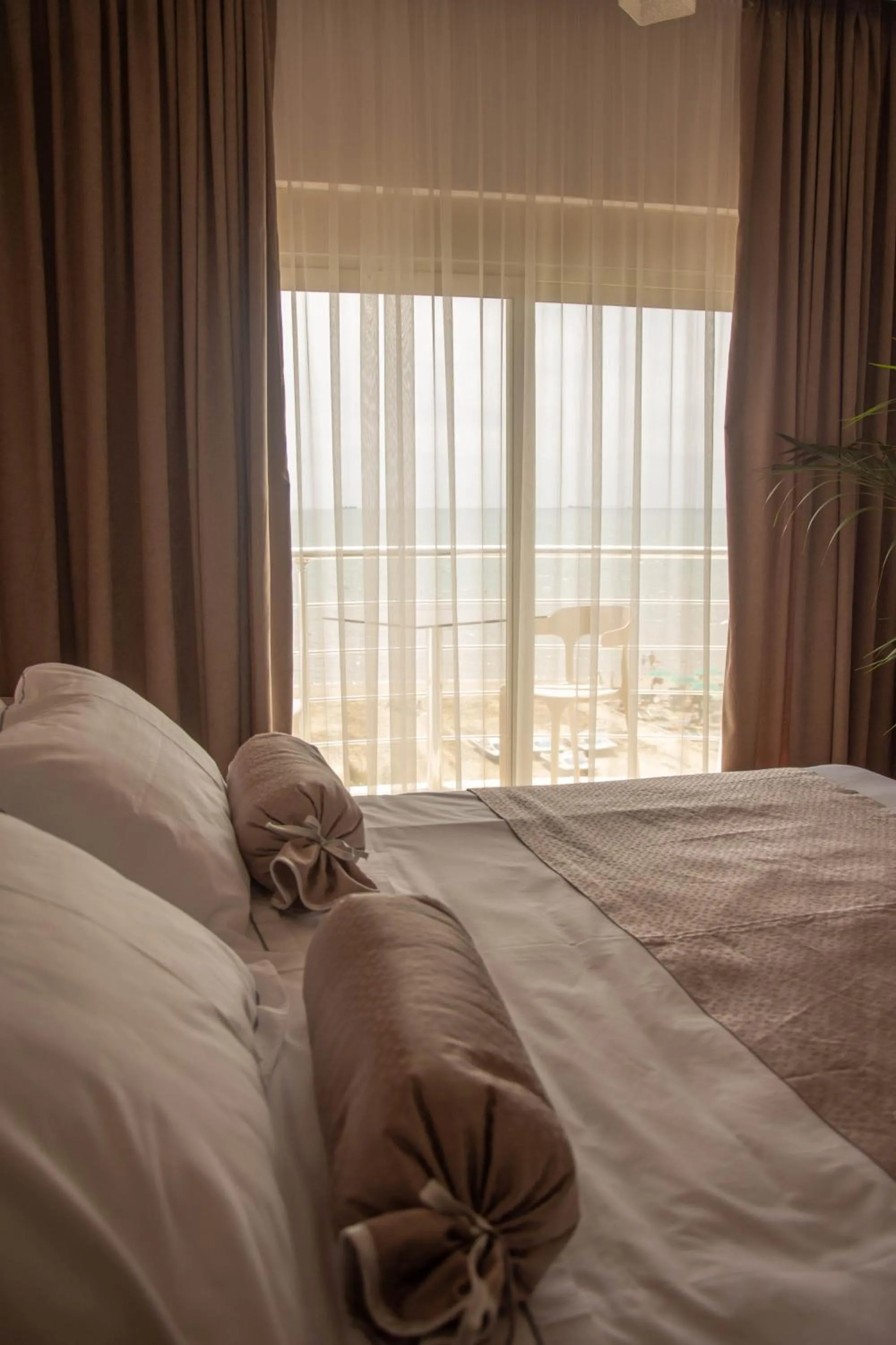 Bed in Wave Beachfront Apartments